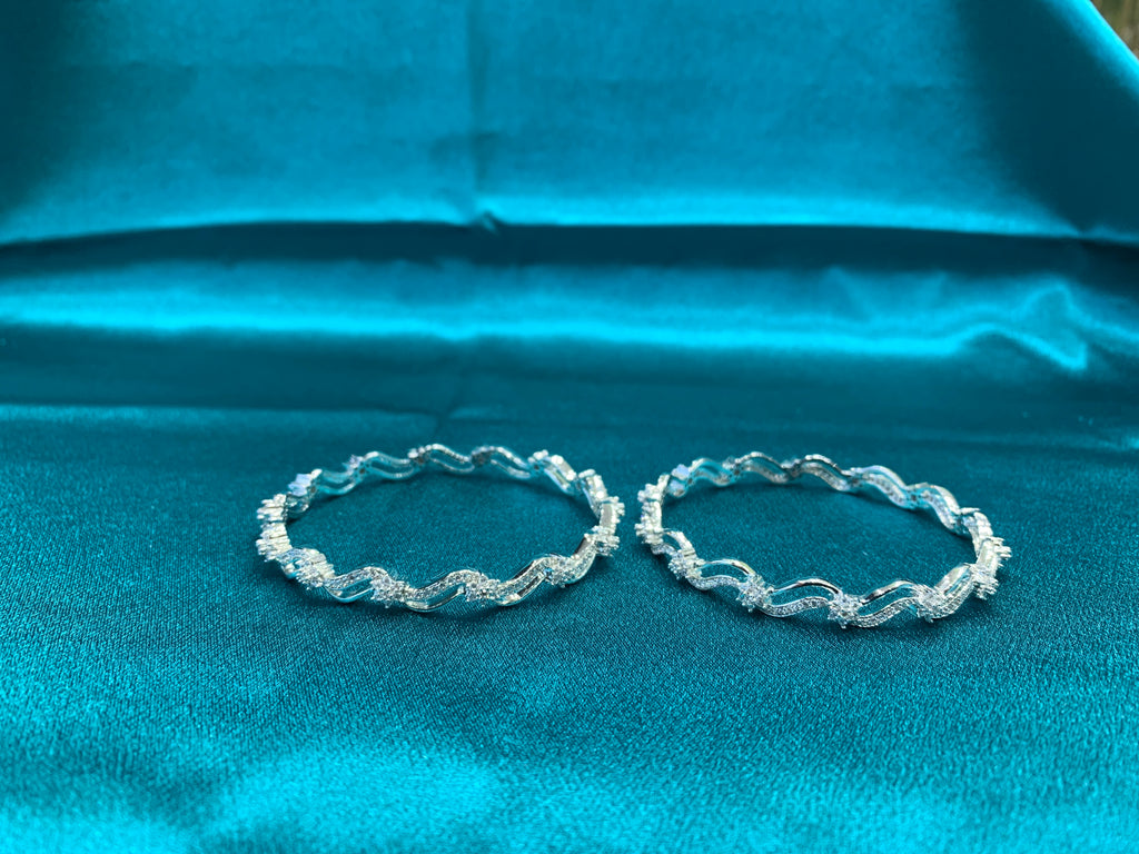 Elegant CZ diamond silver bangles with wavy design and white CZ diamonds