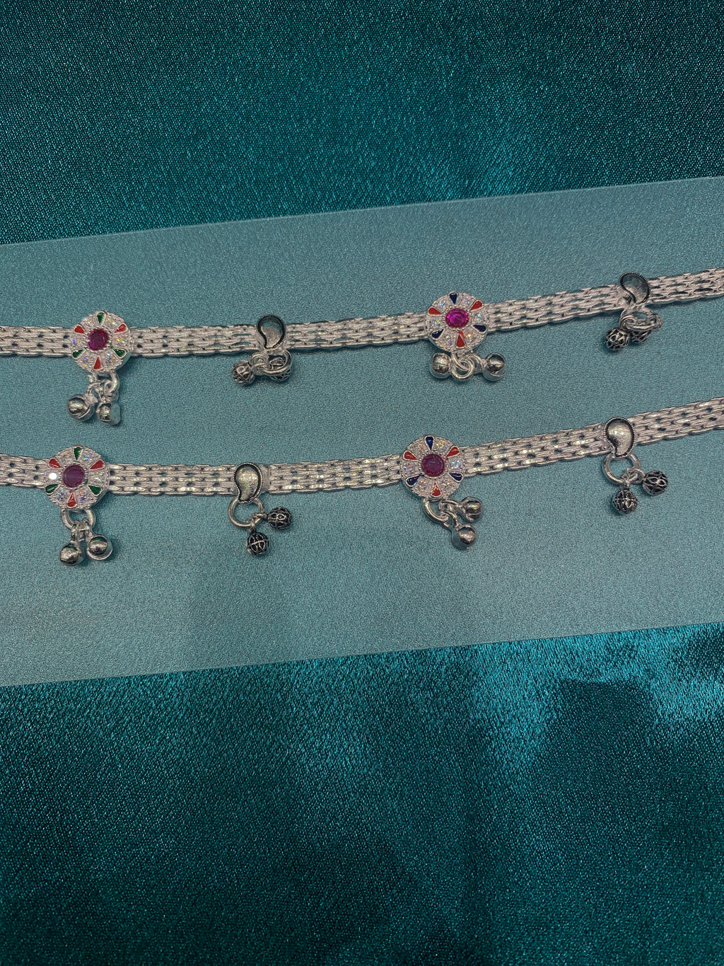Traditional silver anklets with pink CZ diamonds and antique bells