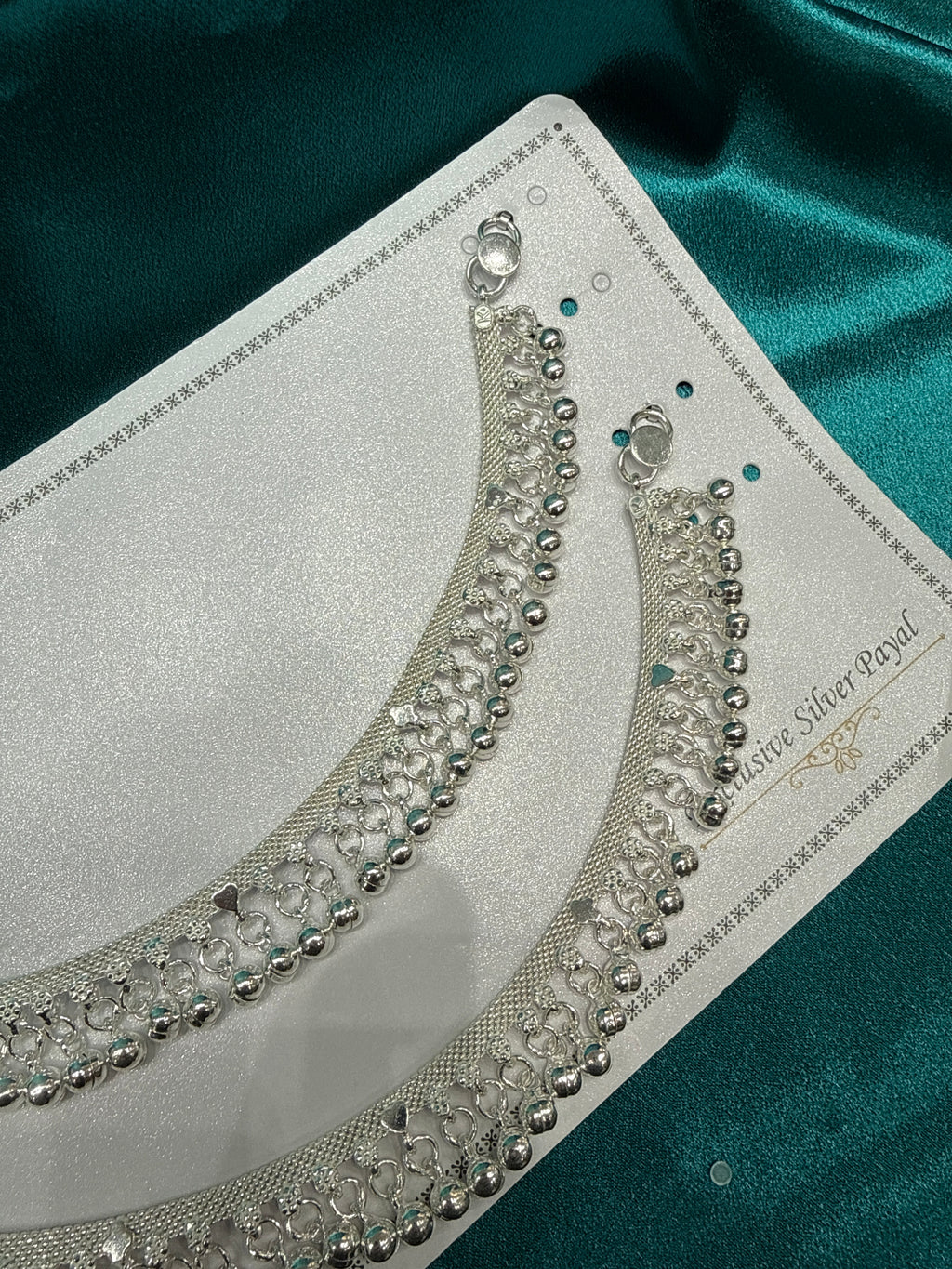Traditional heavy silver anklet with bells hanging