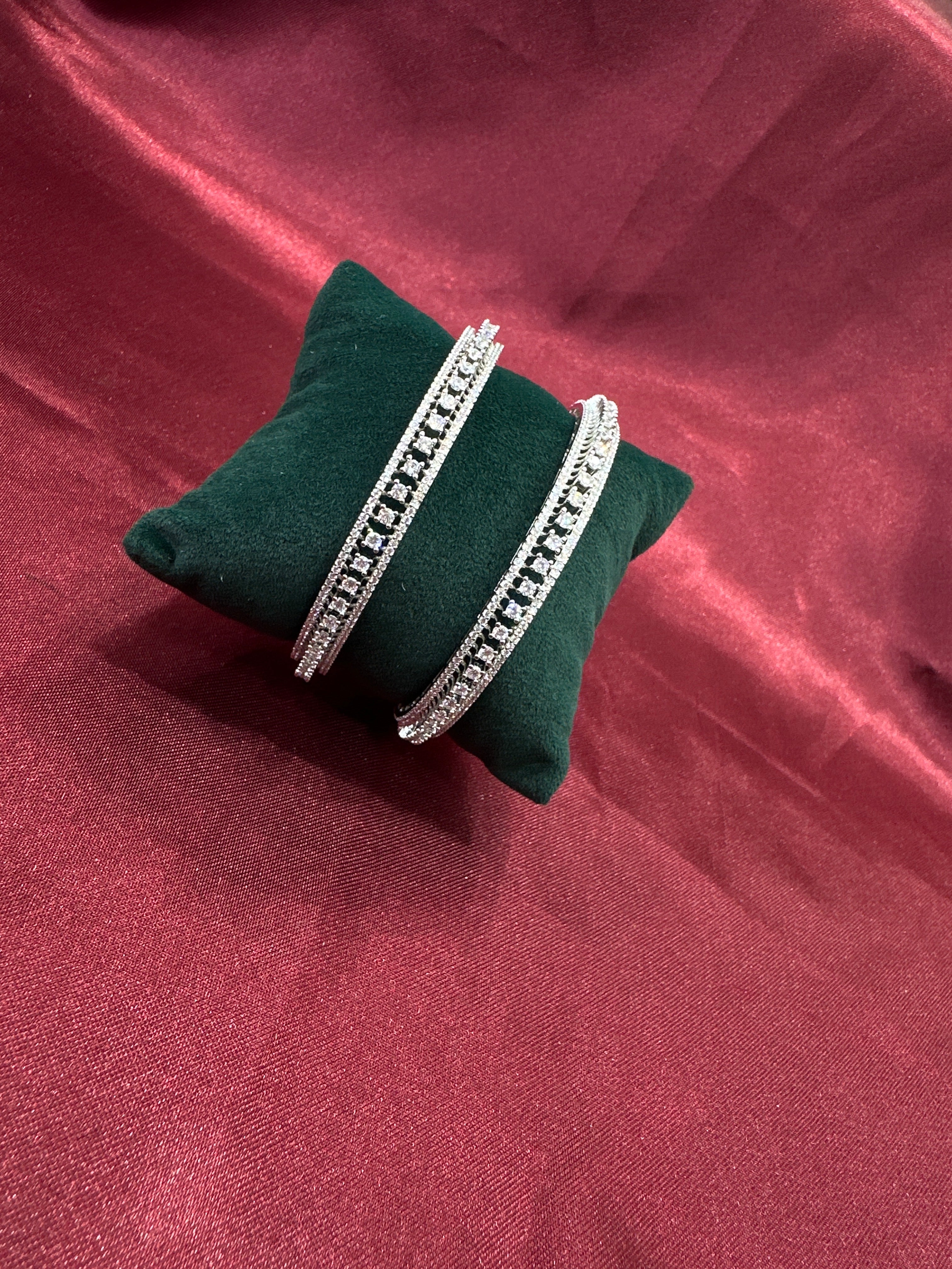 Elegant CZ diamond silver bangles with white stone in sequence design