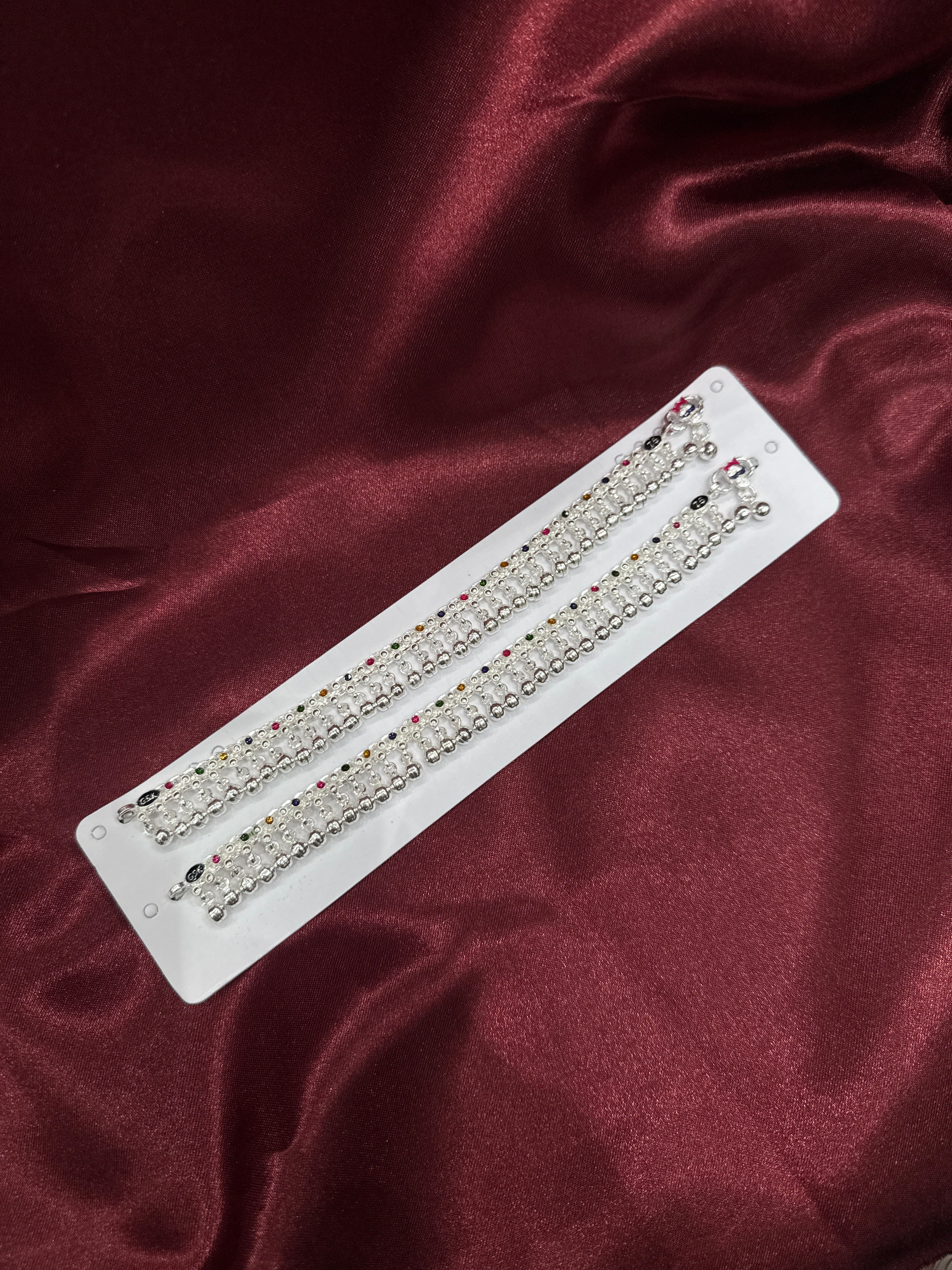 Kids fancy silver anklet with multicolour Meena and full row of bells (Size: 10-12 year old)