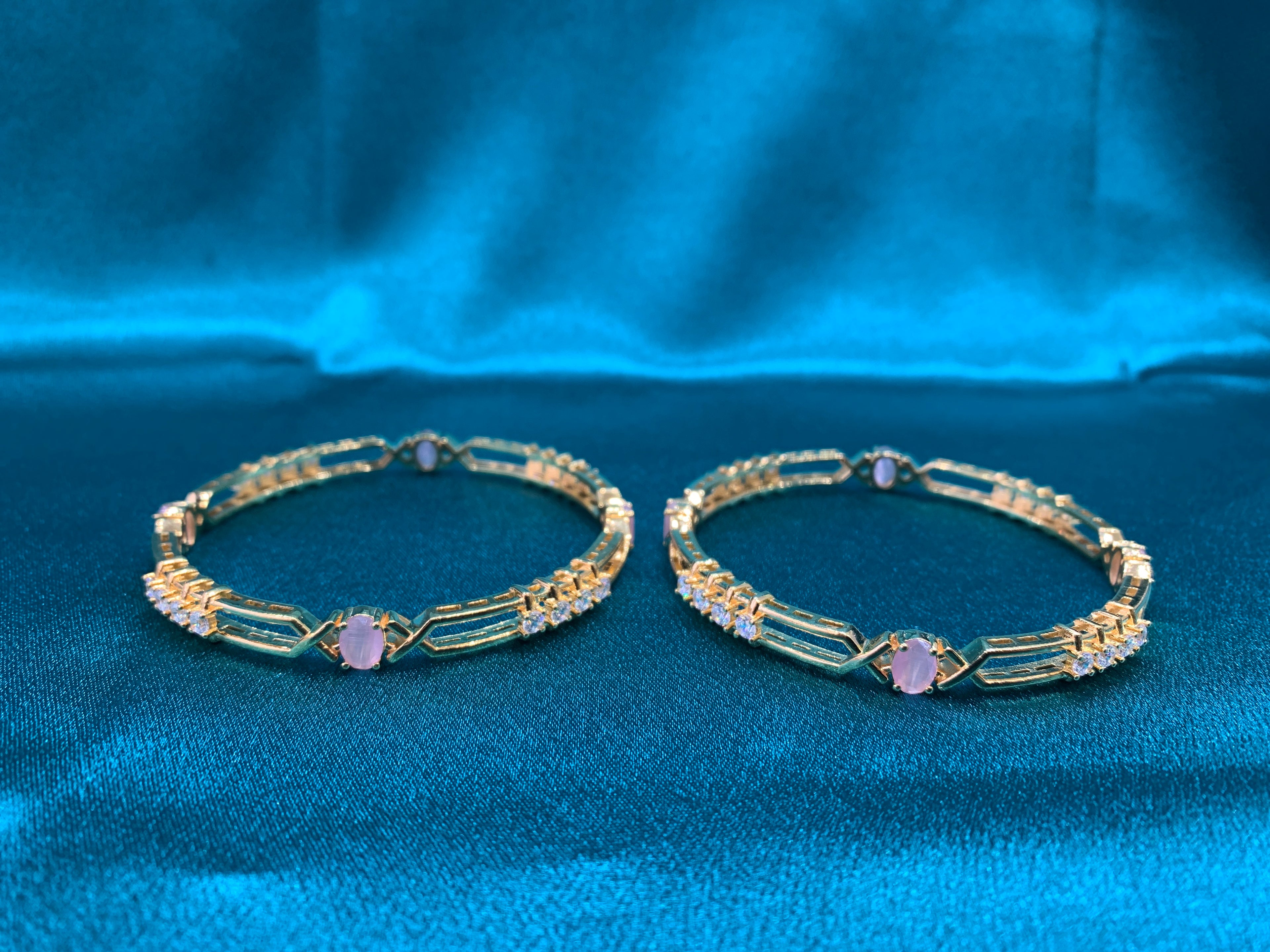 Dazzling gold plated silver bangles with peach CZ diamonds