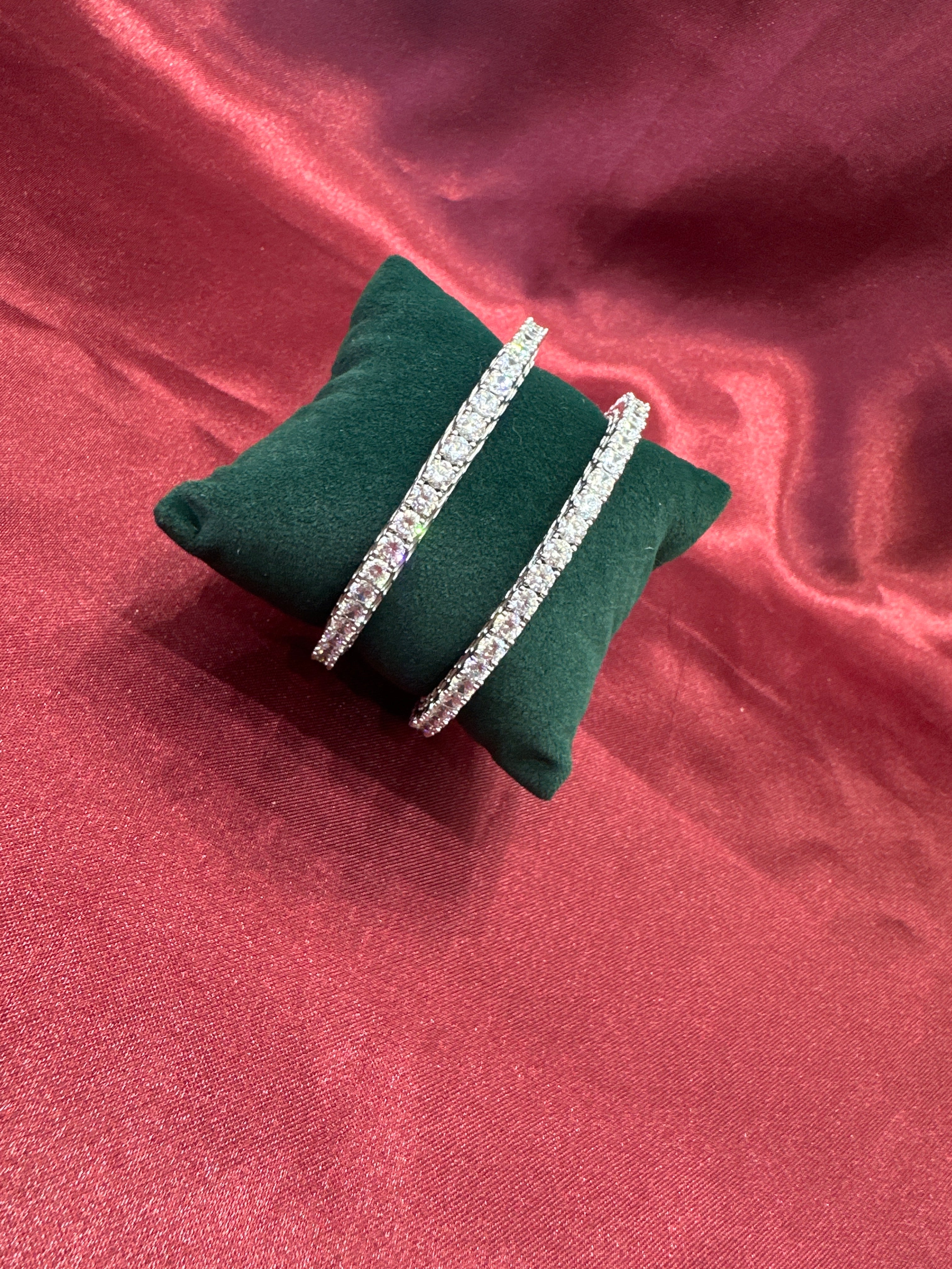 Elegant CZ diamond silver bangles with white stone in sequence design
