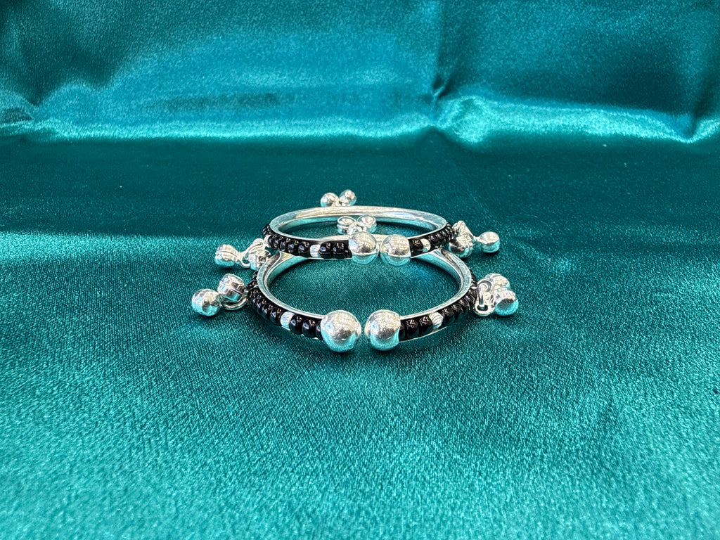 Silver baby bangles with black beads and bells BBB6