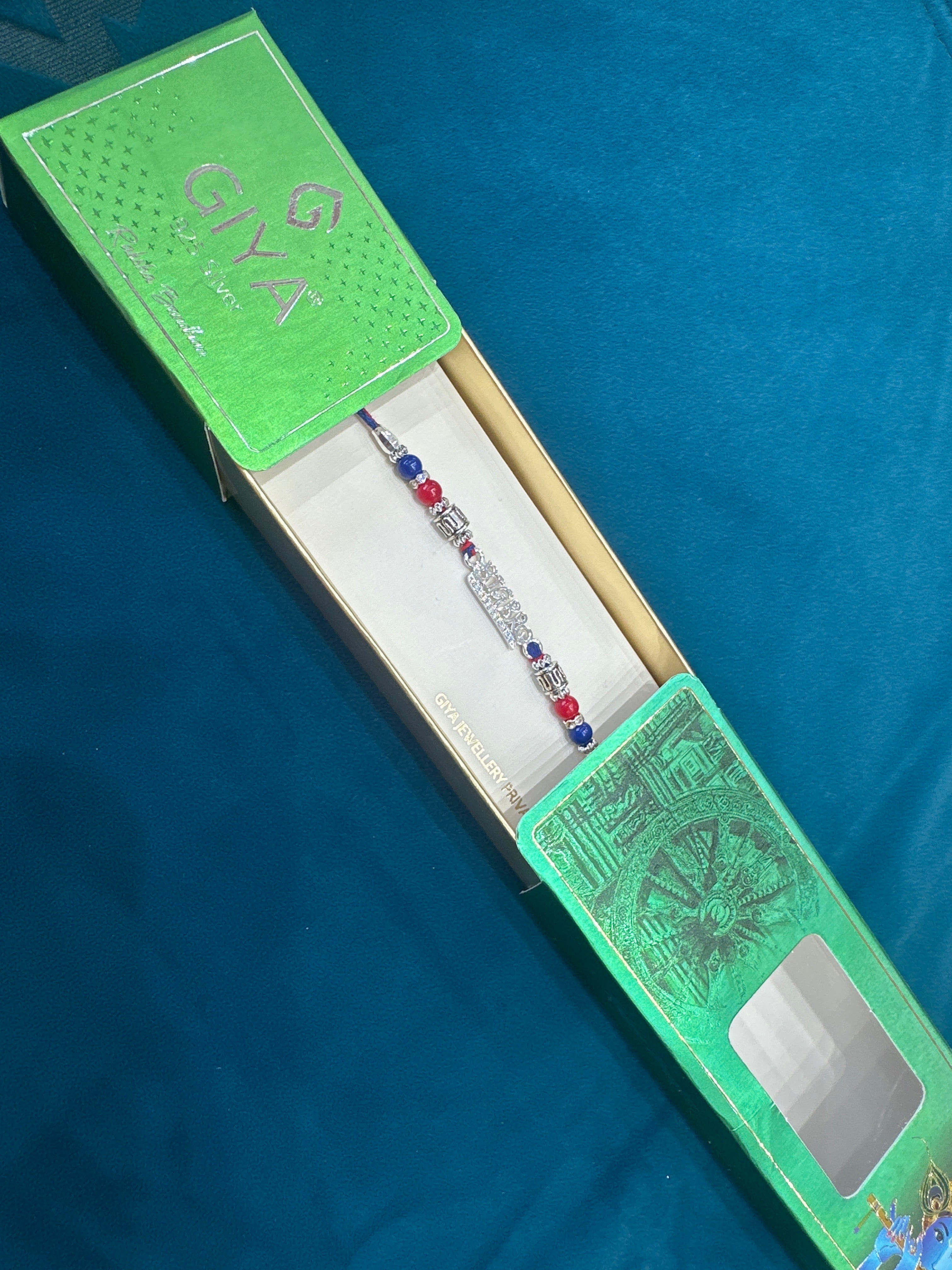 Silver Fancy Rakhi