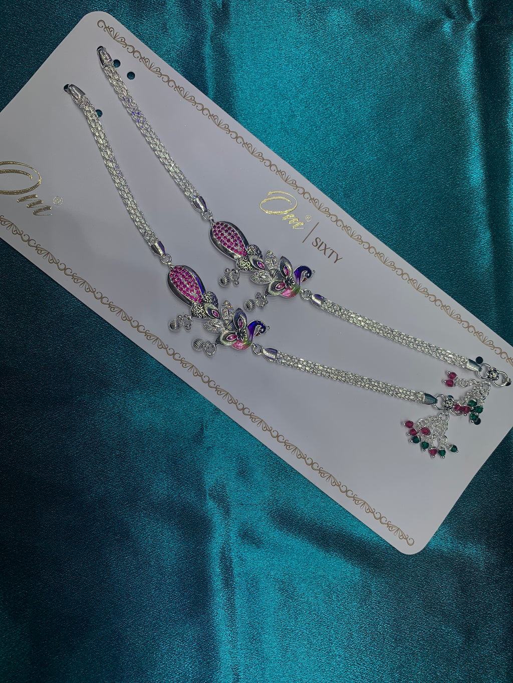 Fancy silver anklets with peacock design