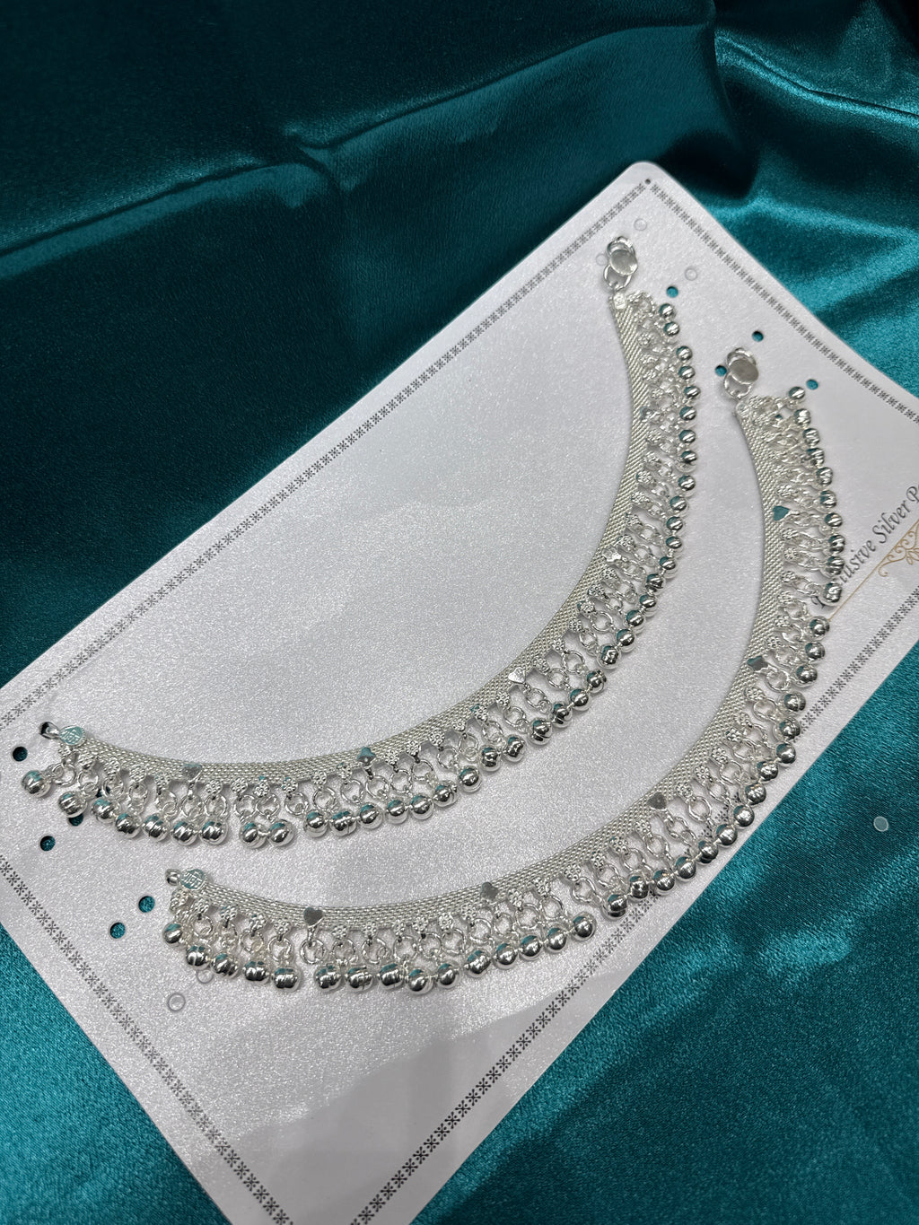 Traditional heavy silver anklet with bells hanging