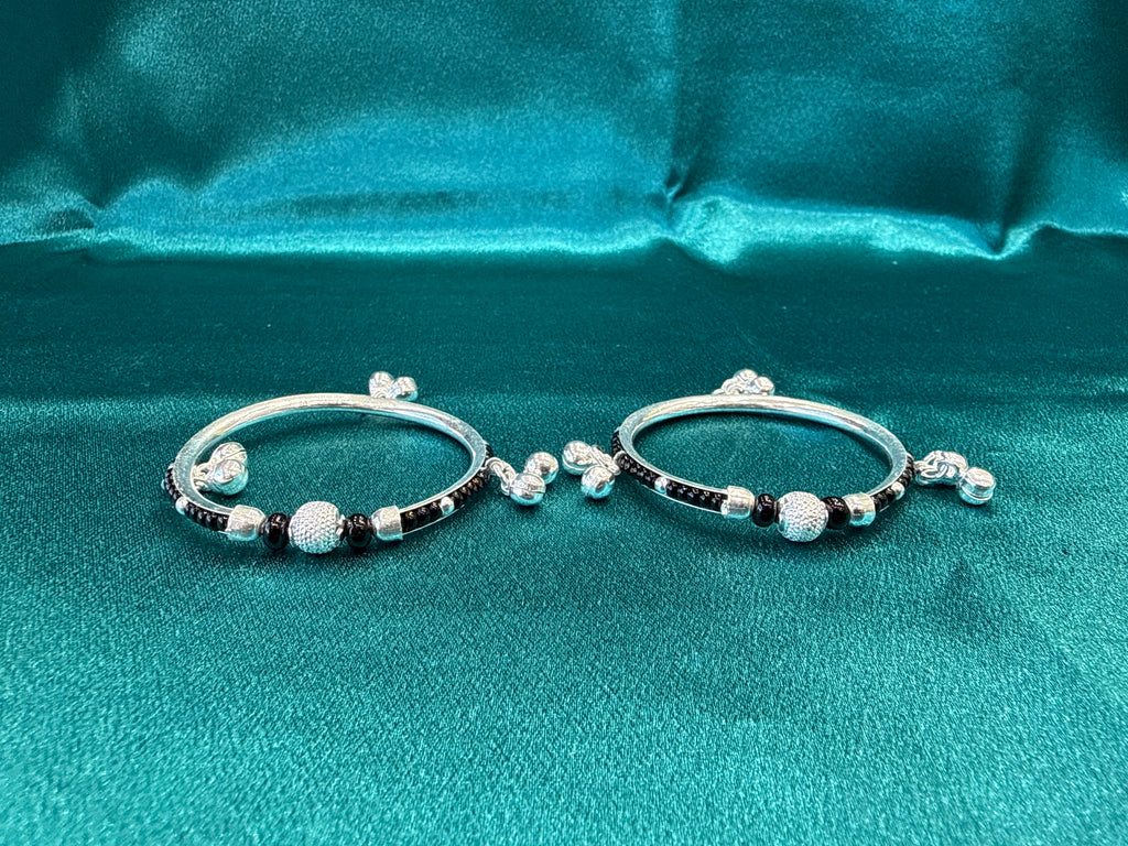 Silver baby bangles with black beads and bells BBB7