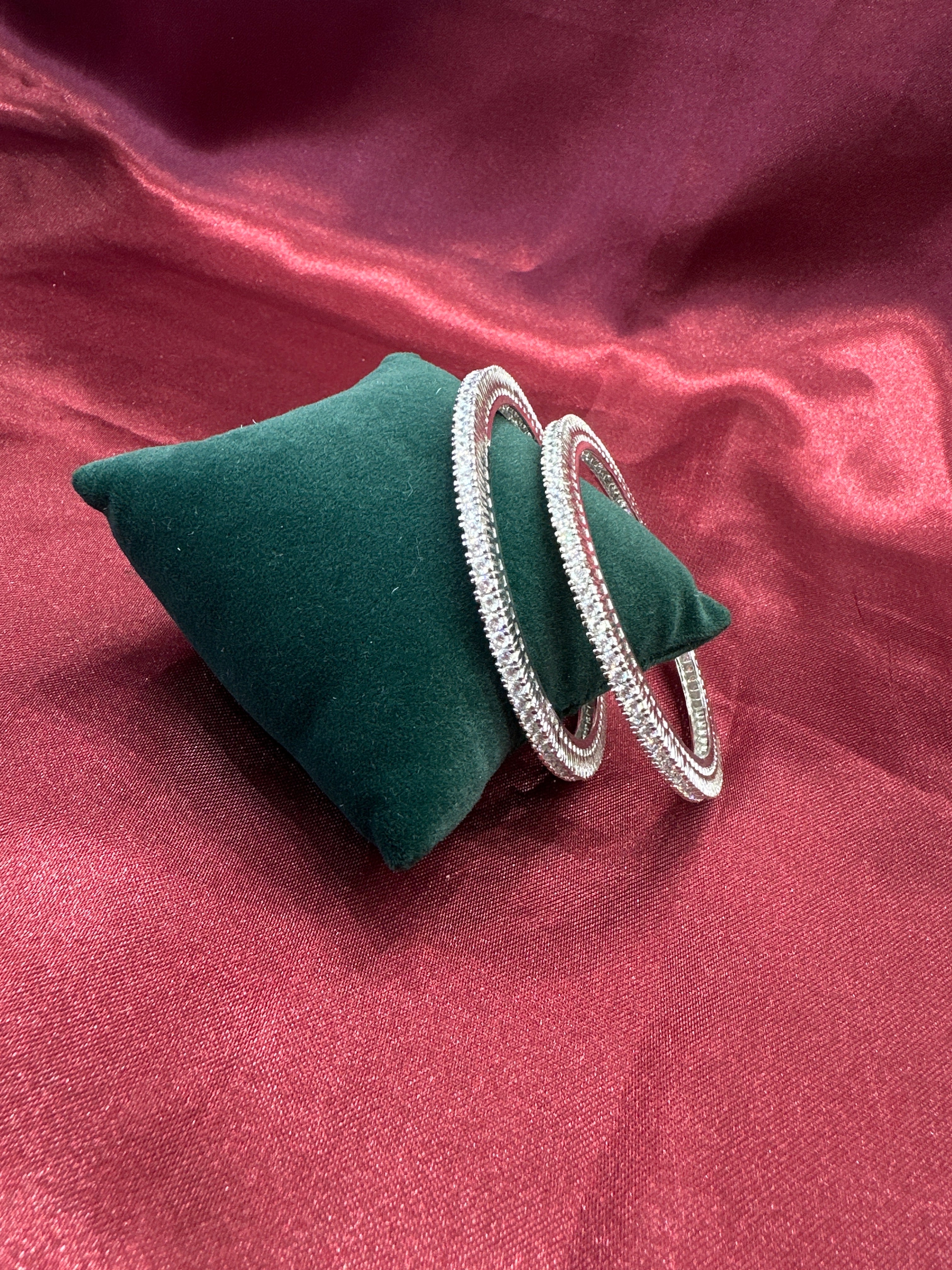 Elegant CZ diamond silver bangles with white stone in sequence design