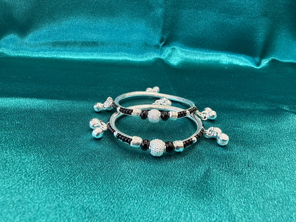 Silver baby bangles with black beads and bells BBB7