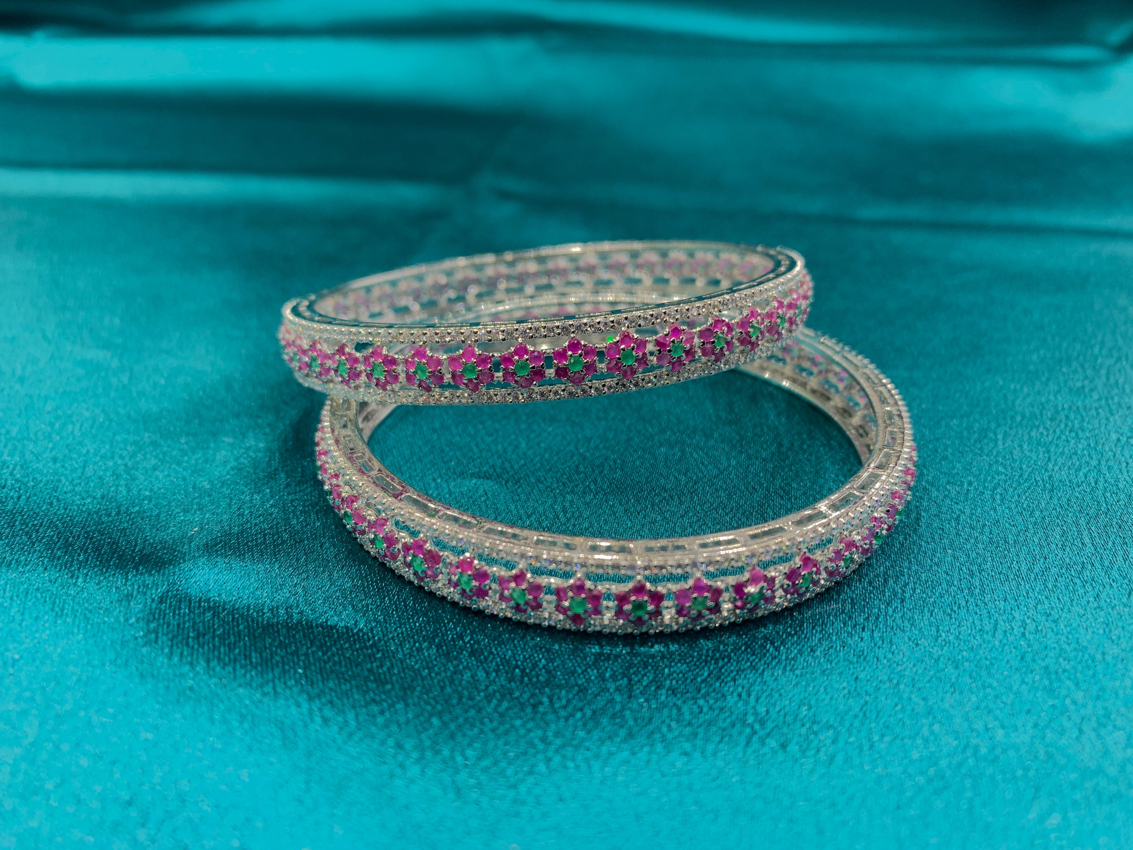 Elegant CZ diamond bangles with green and pink CZ diamonds