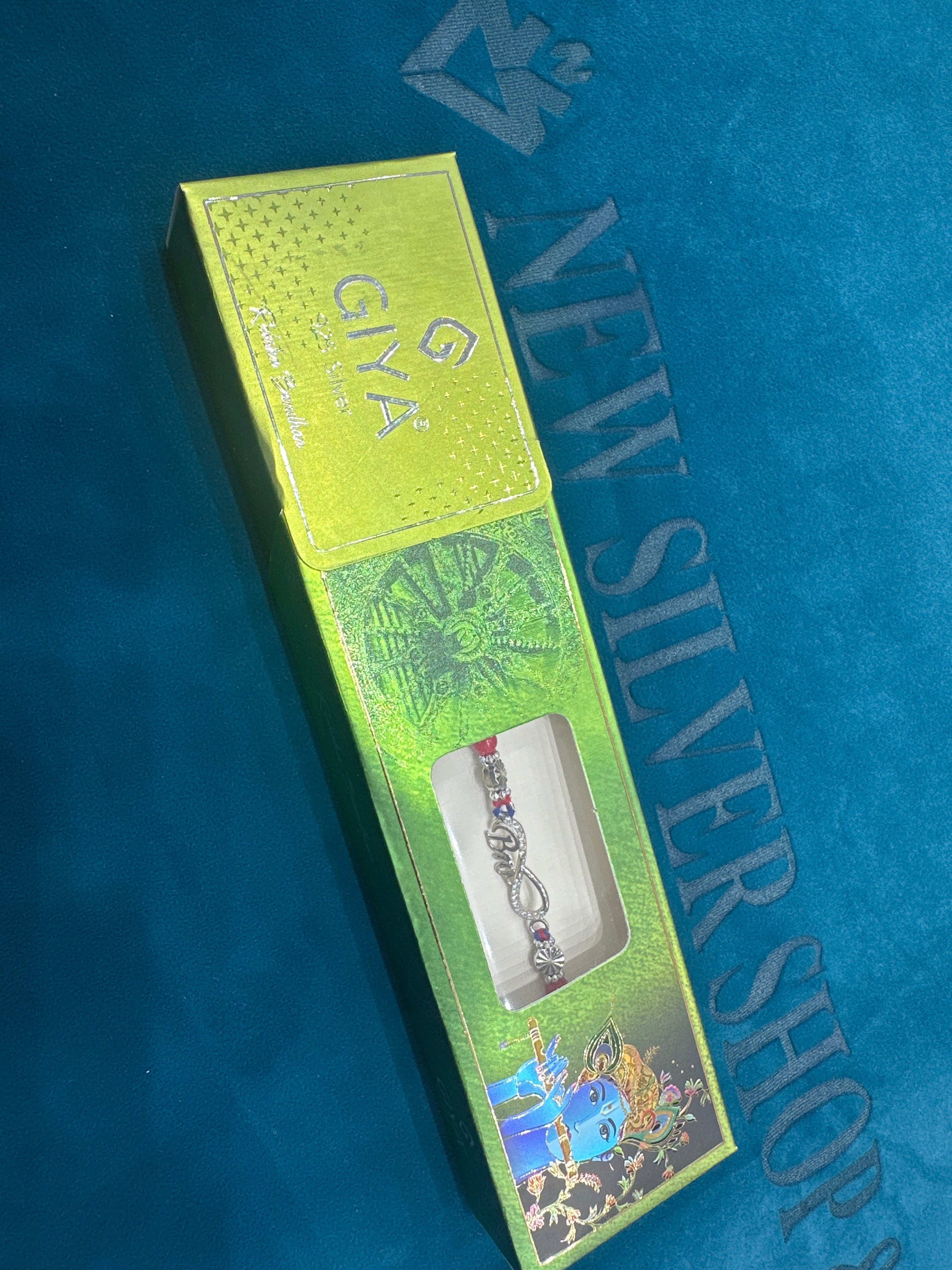 Silver Fancy Rakhi