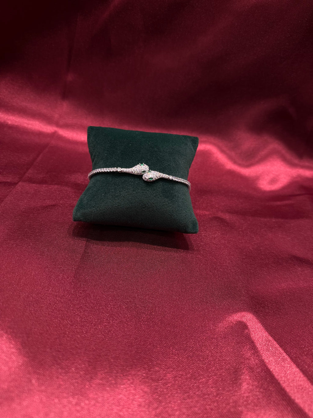 Fancy silver serpent bracelet CZ diamond with green stone