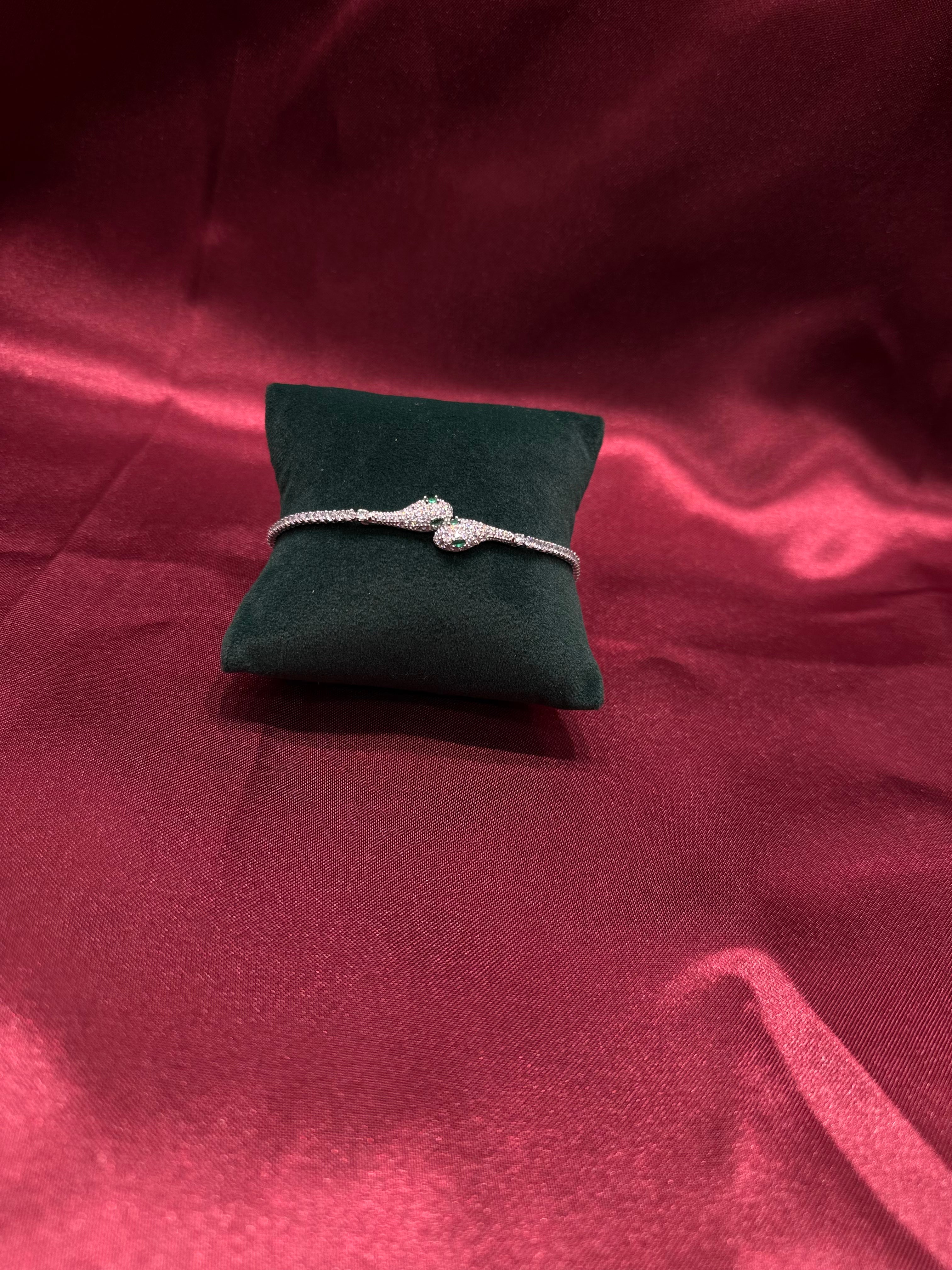 Fancy silver serpent bracelet CZ diamond with green stone