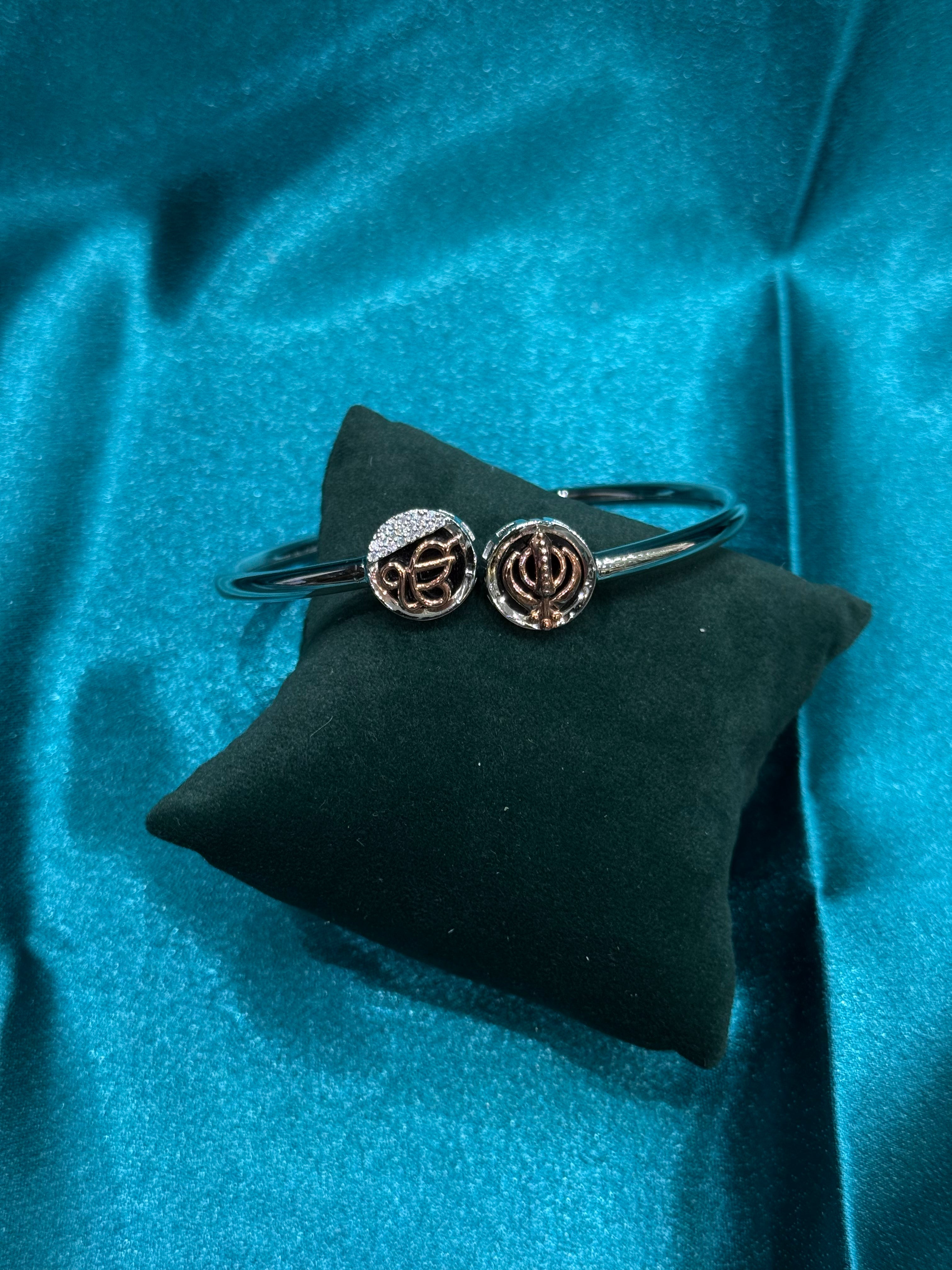 Fancy silver  open end bangle with Khanda and Ik Onkar on both ends