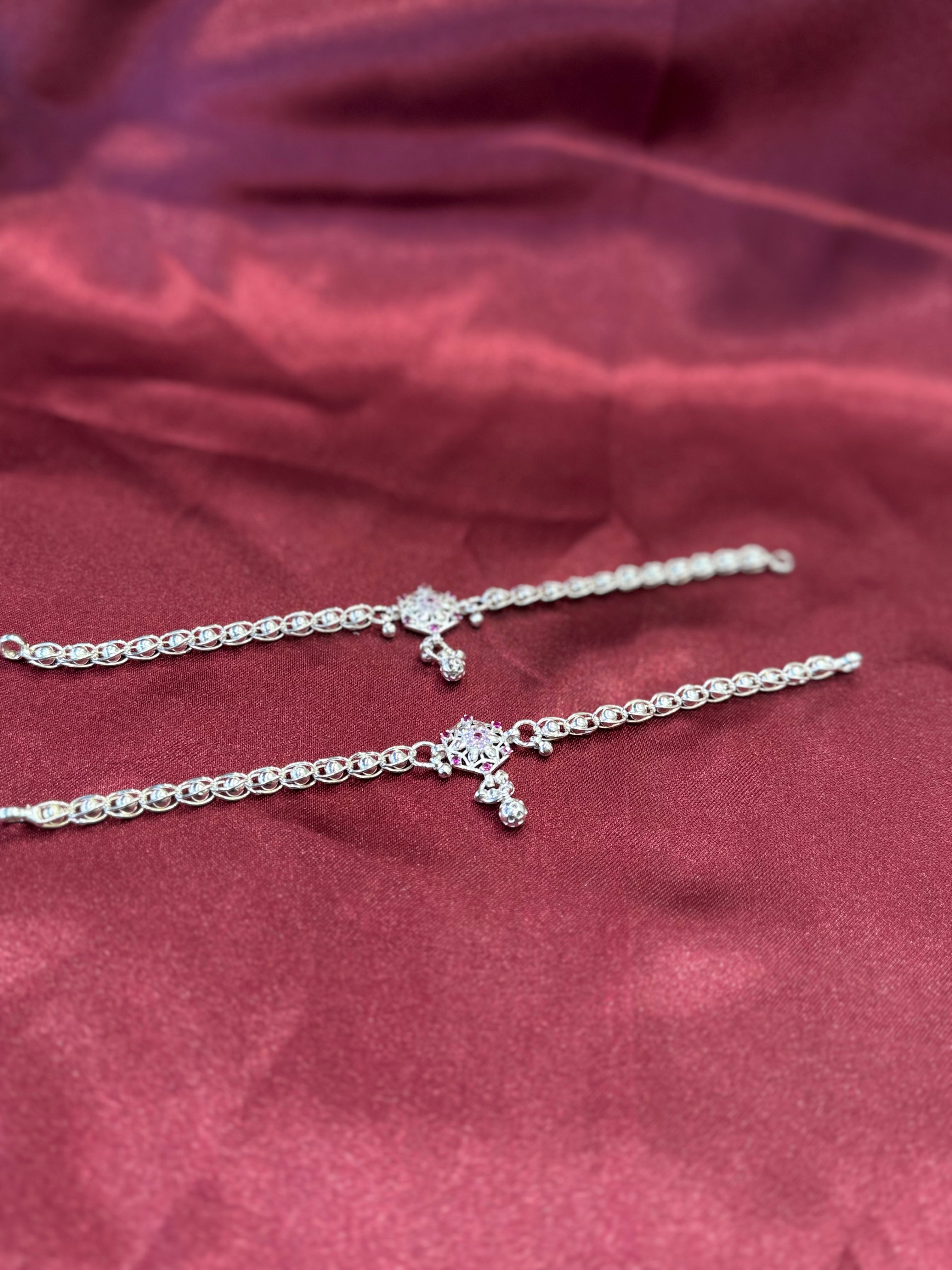 Kids fancy silver anklets with pink stone studded flower pattern in the centre (10-12 year old)