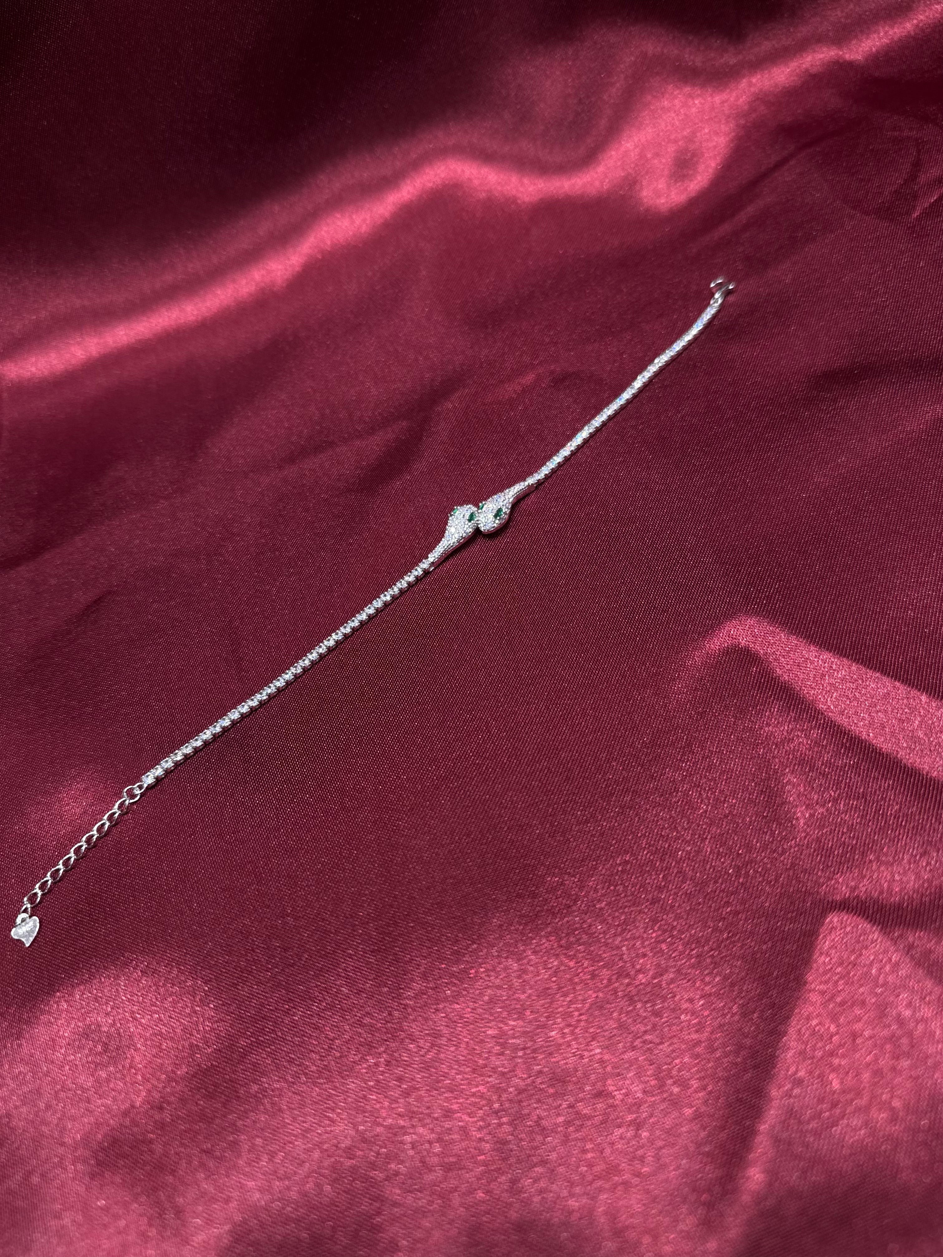 Fancy silver serpent bracelet CZ diamond with green stone