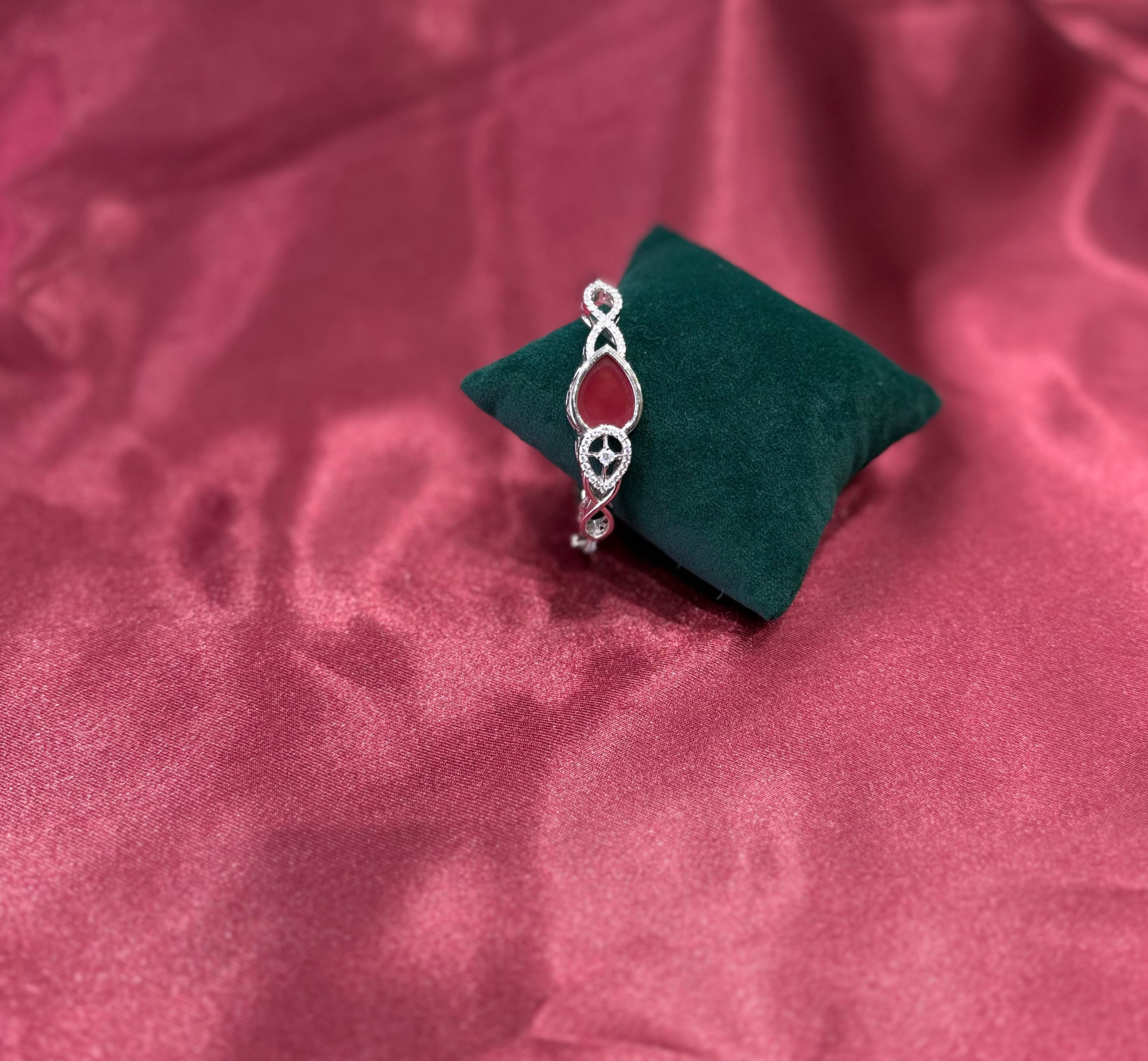 Fancy silver bangle CZ diamond with red stone in the middle