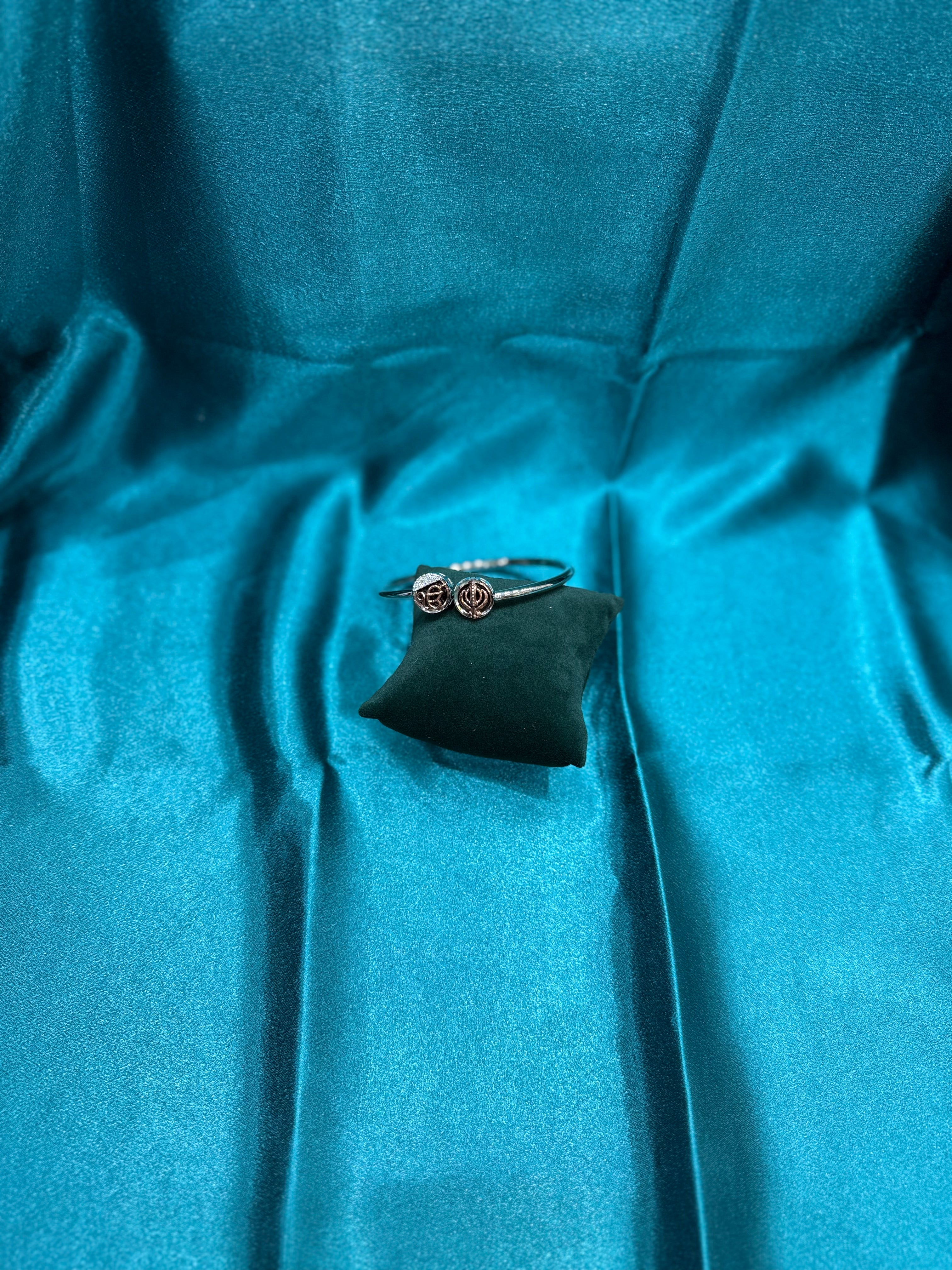 Fancy silver  open end bangle with Khanda and Ik Onkar on both ends