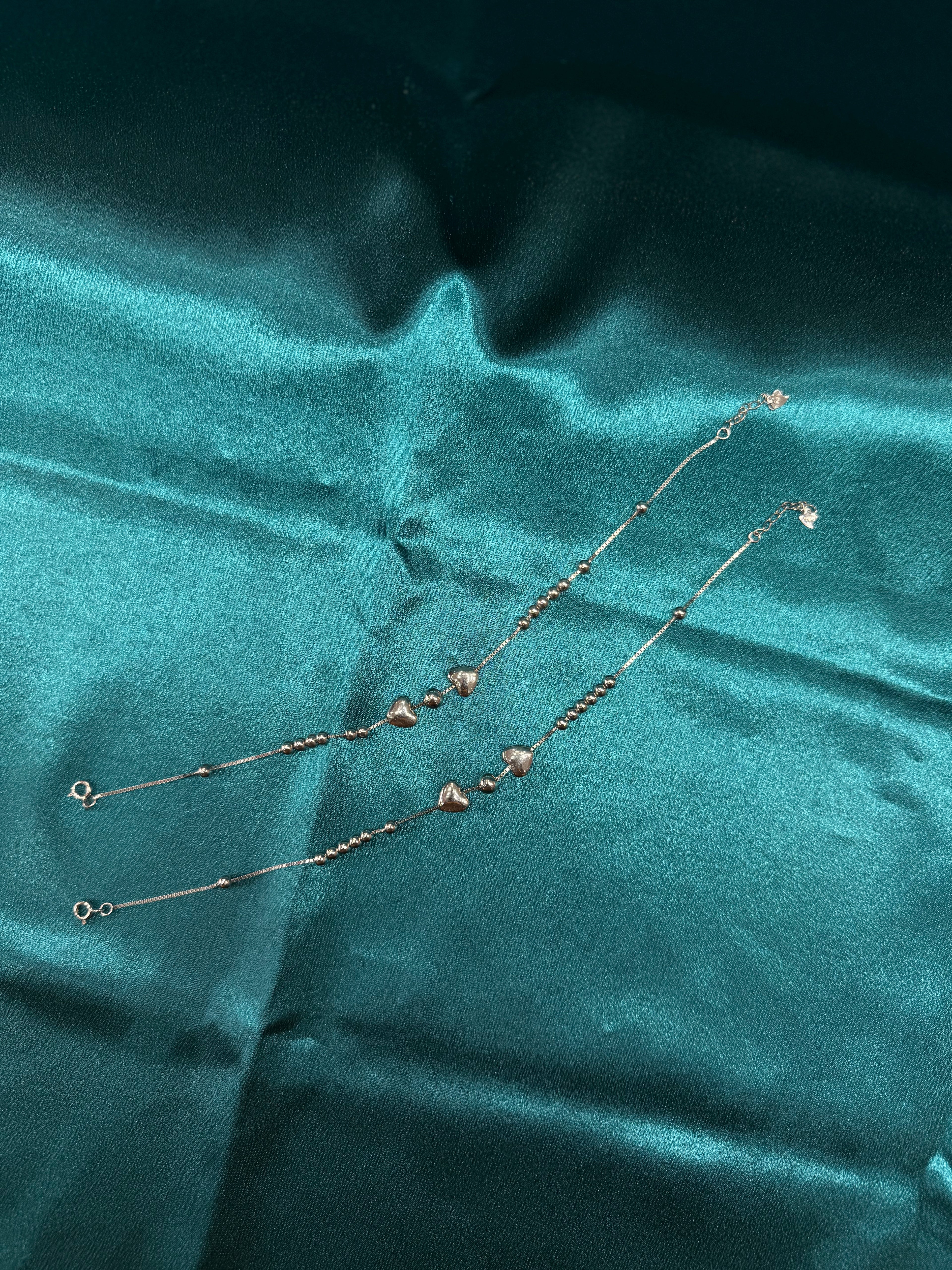 Fancy silver anklet with round and heart beads