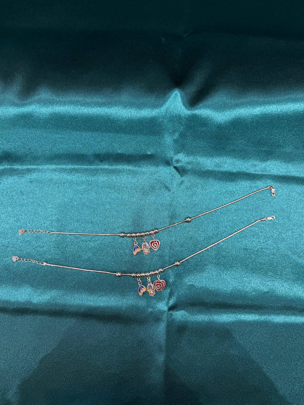 Fancy silver anklet with hanging flower beads