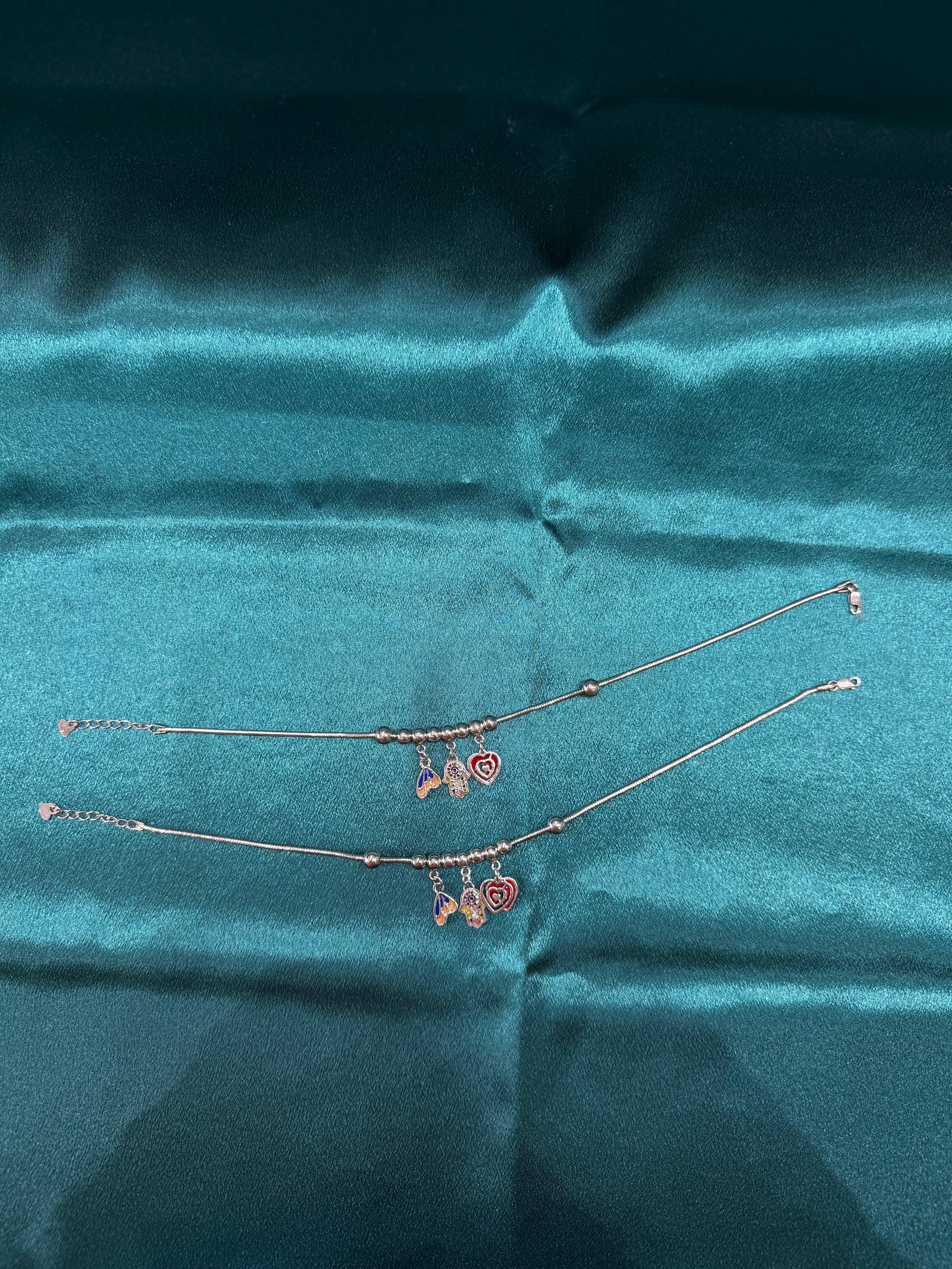 Fancy silver anklet with hanging flower beads