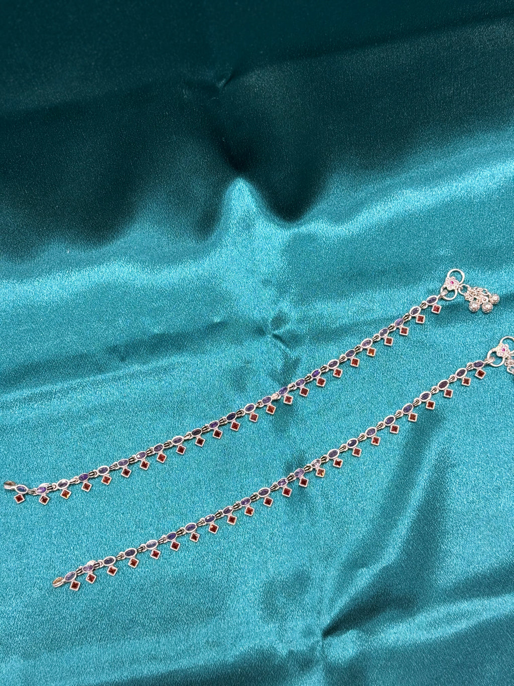 Fancy silver anklets with purple and orange CZ stones