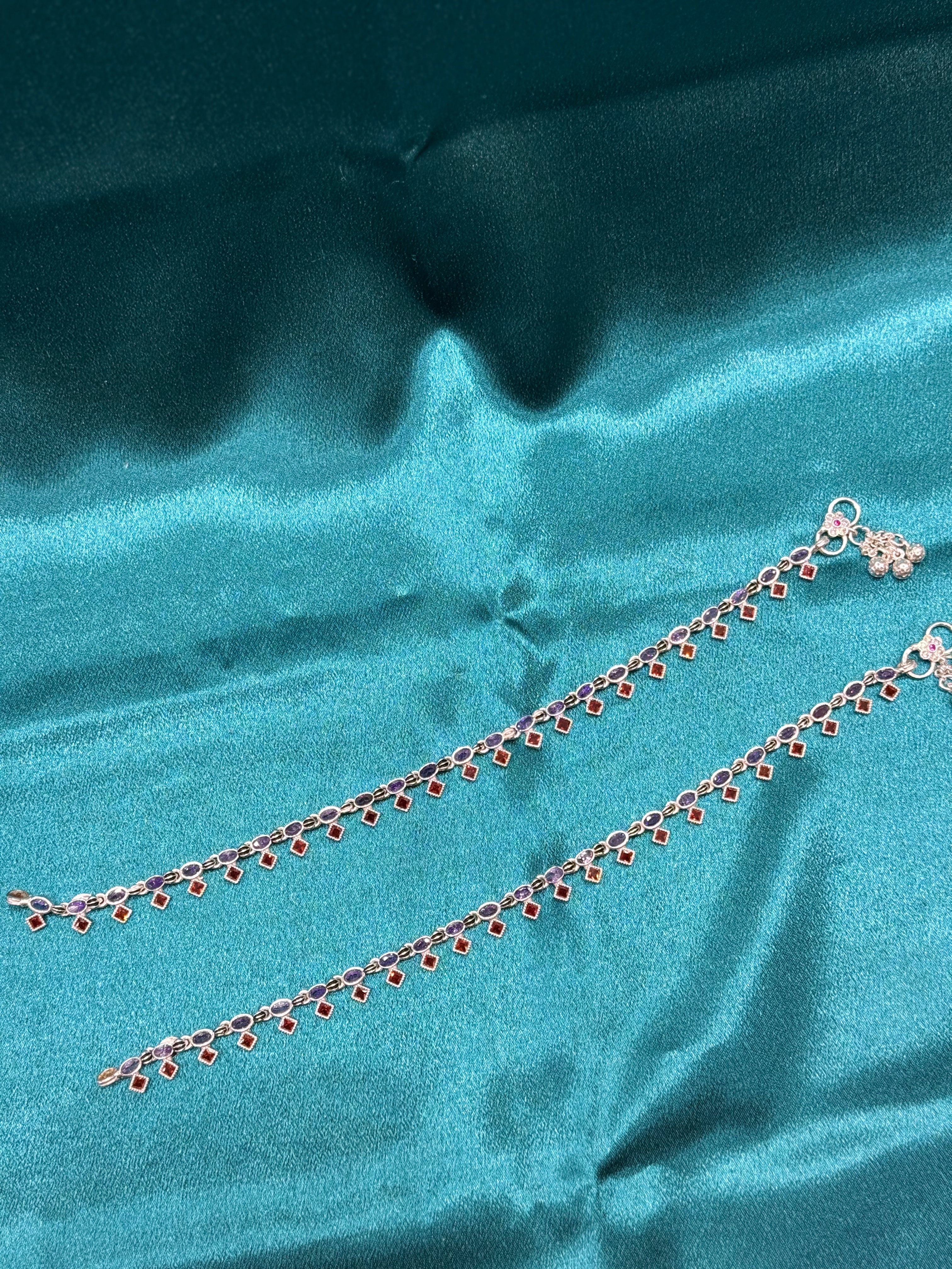 Fancy silver anklets with purple and orange CZ stones