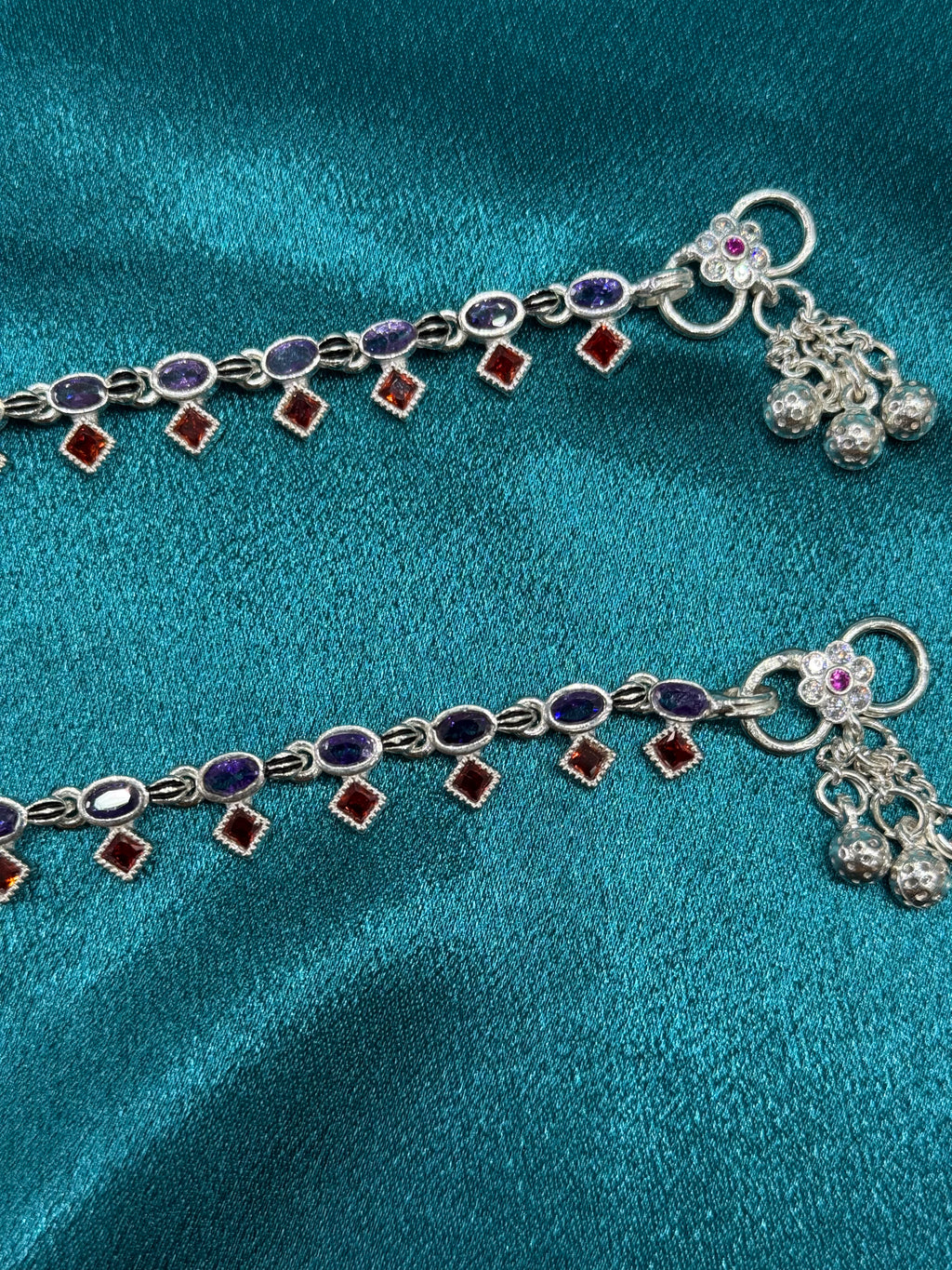 Fancy silver anklets with purple and orange CZ stones