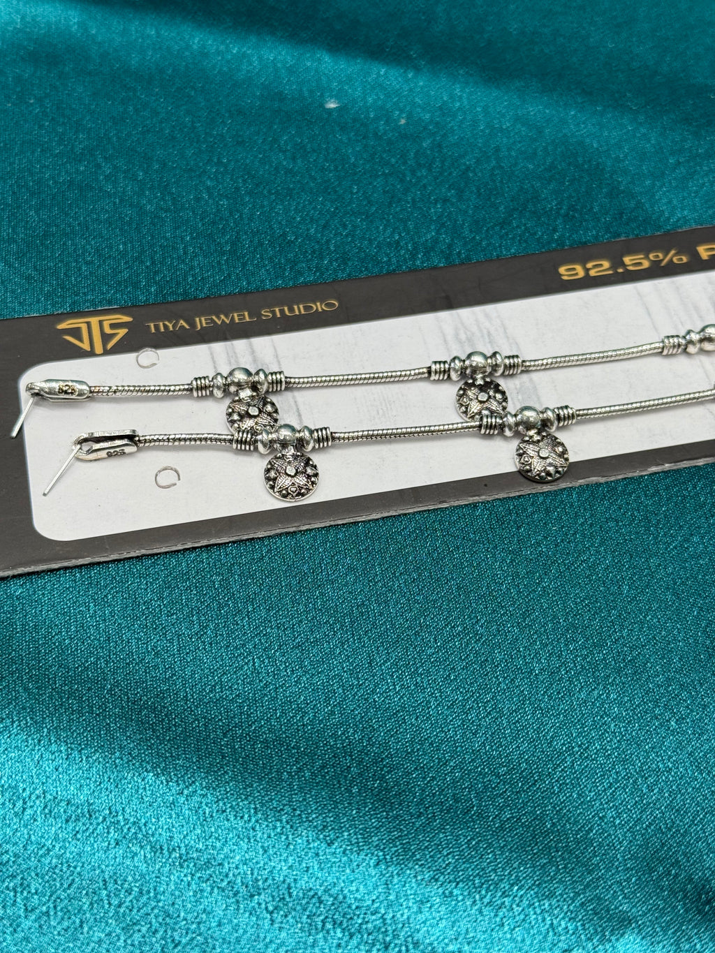 Fancy silver anklet in antique finish with beads and charms
