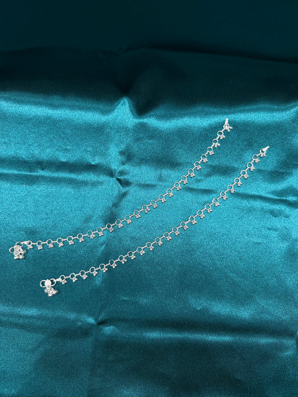 Plain silver anklet with row of small bells
