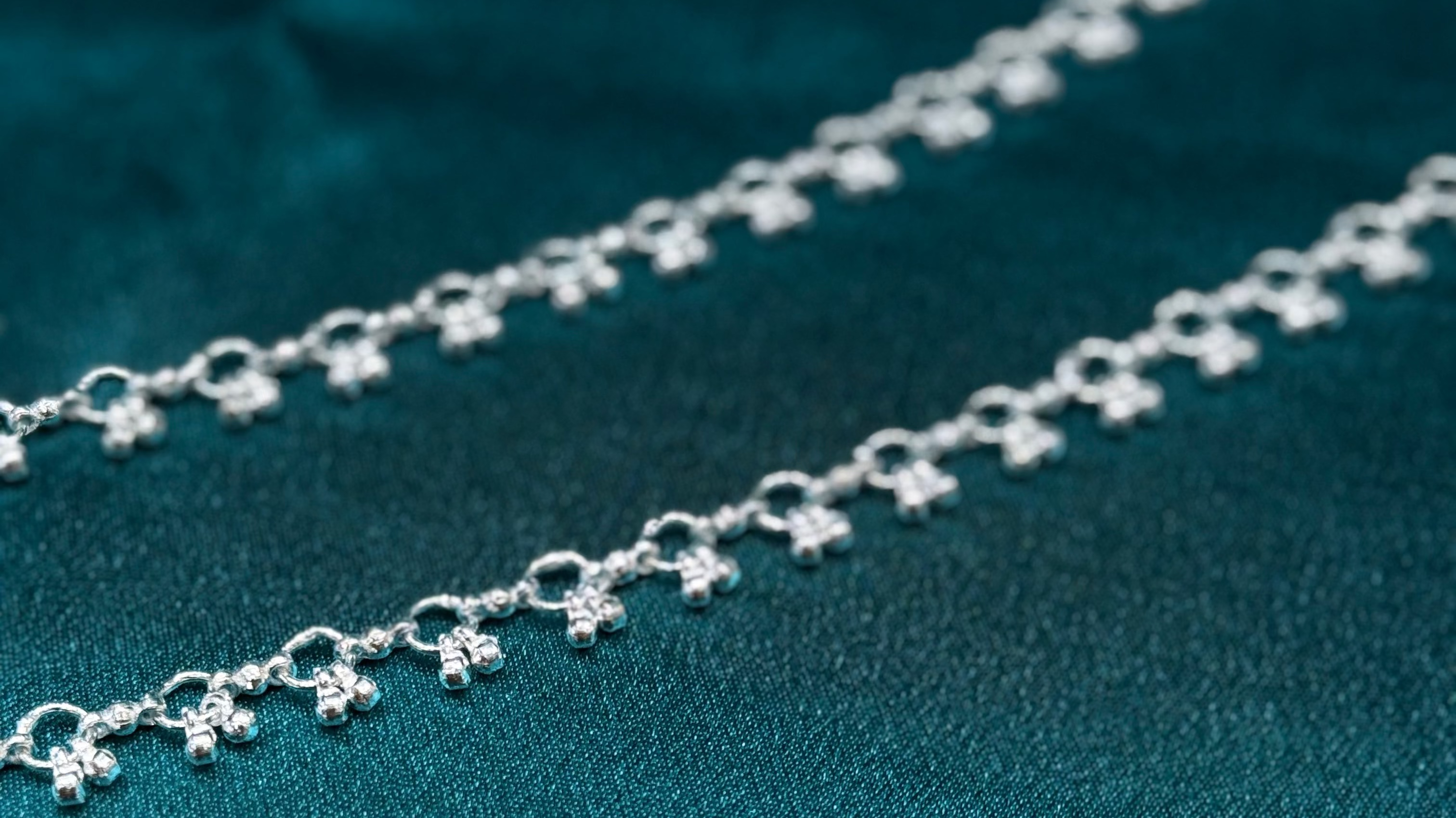 Plain silver anklet with row of small bells
