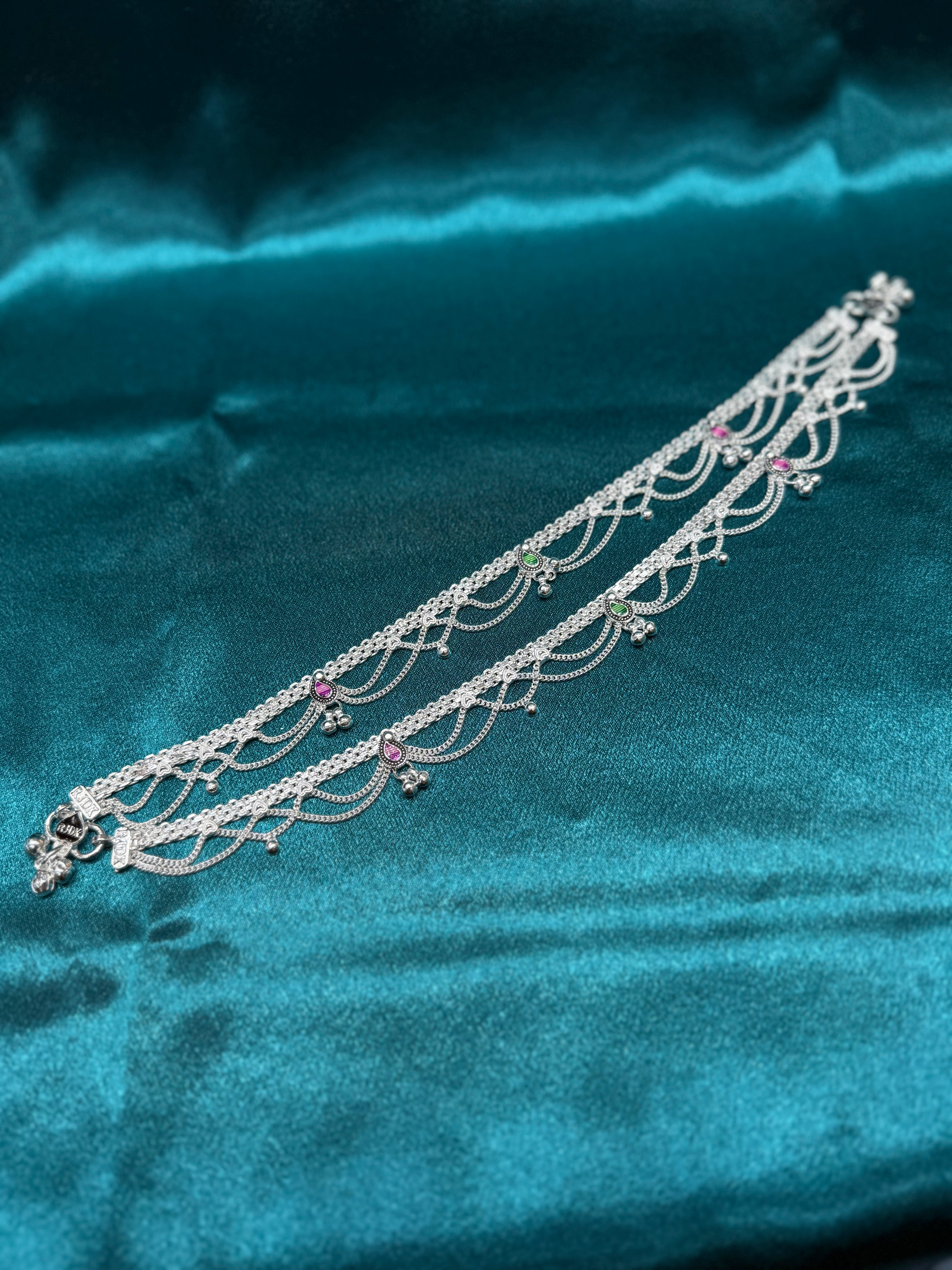 Traditional silver anklet with frill hanging and green and pink pattern