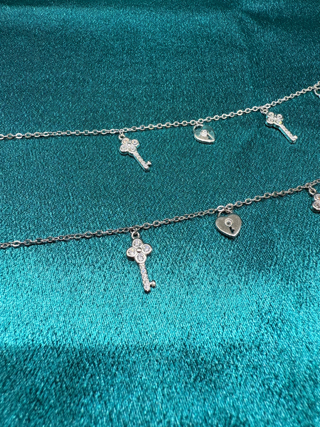 Fancy silver anklet with key and lock hanging beads