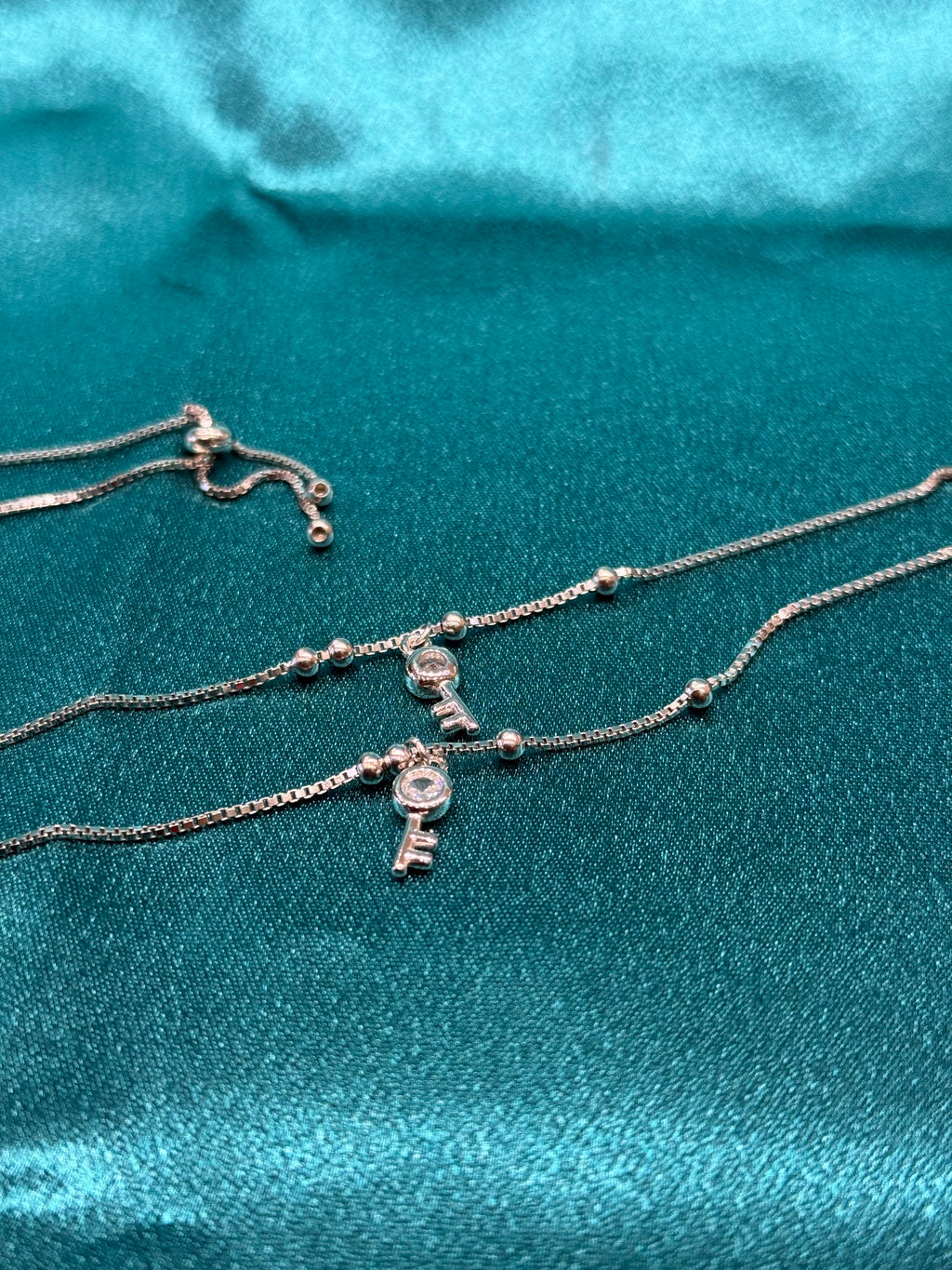 Fancy silver anklet with key and lock stone hanging