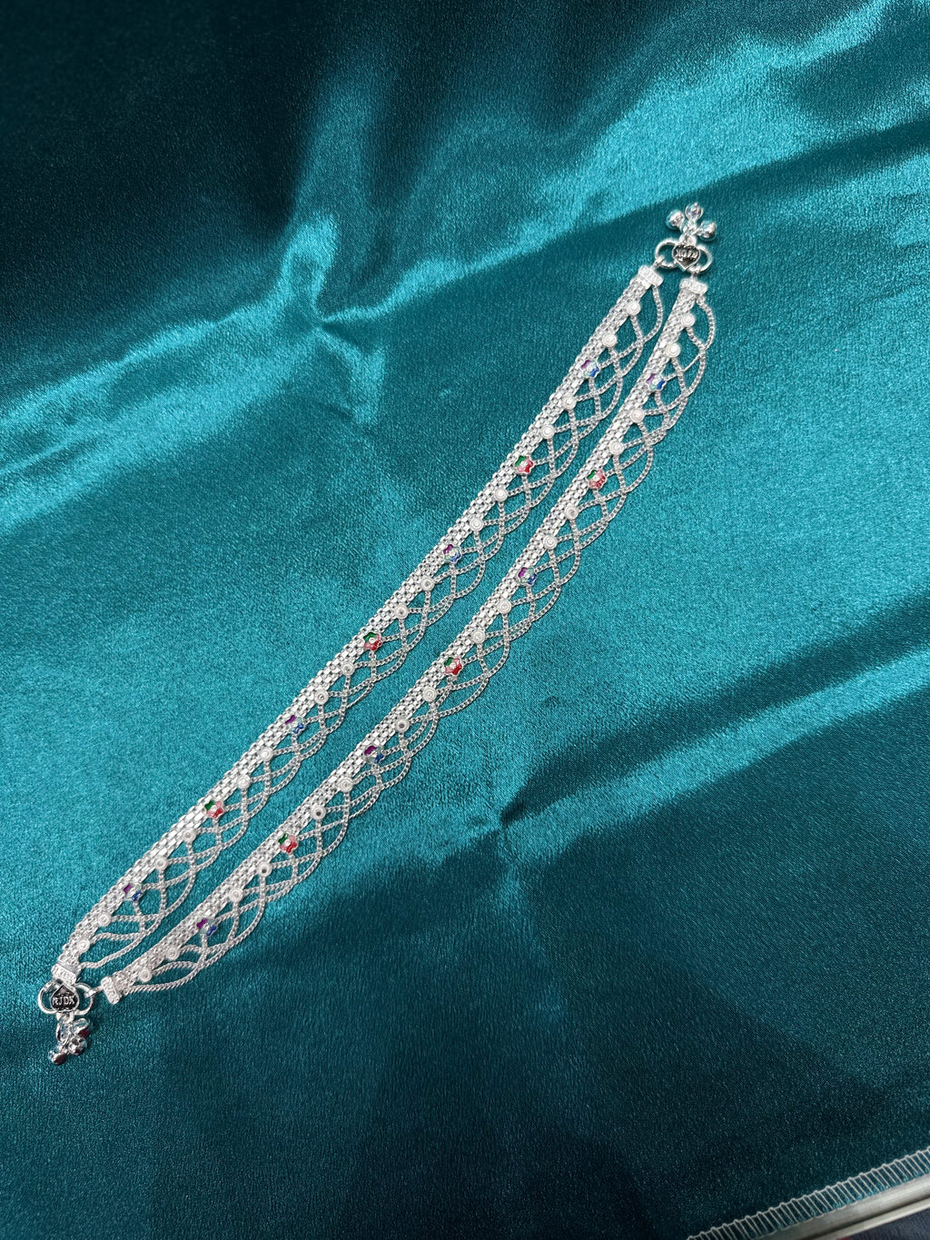 Traditional style filigree silver anklets with multicolour flowers made on it