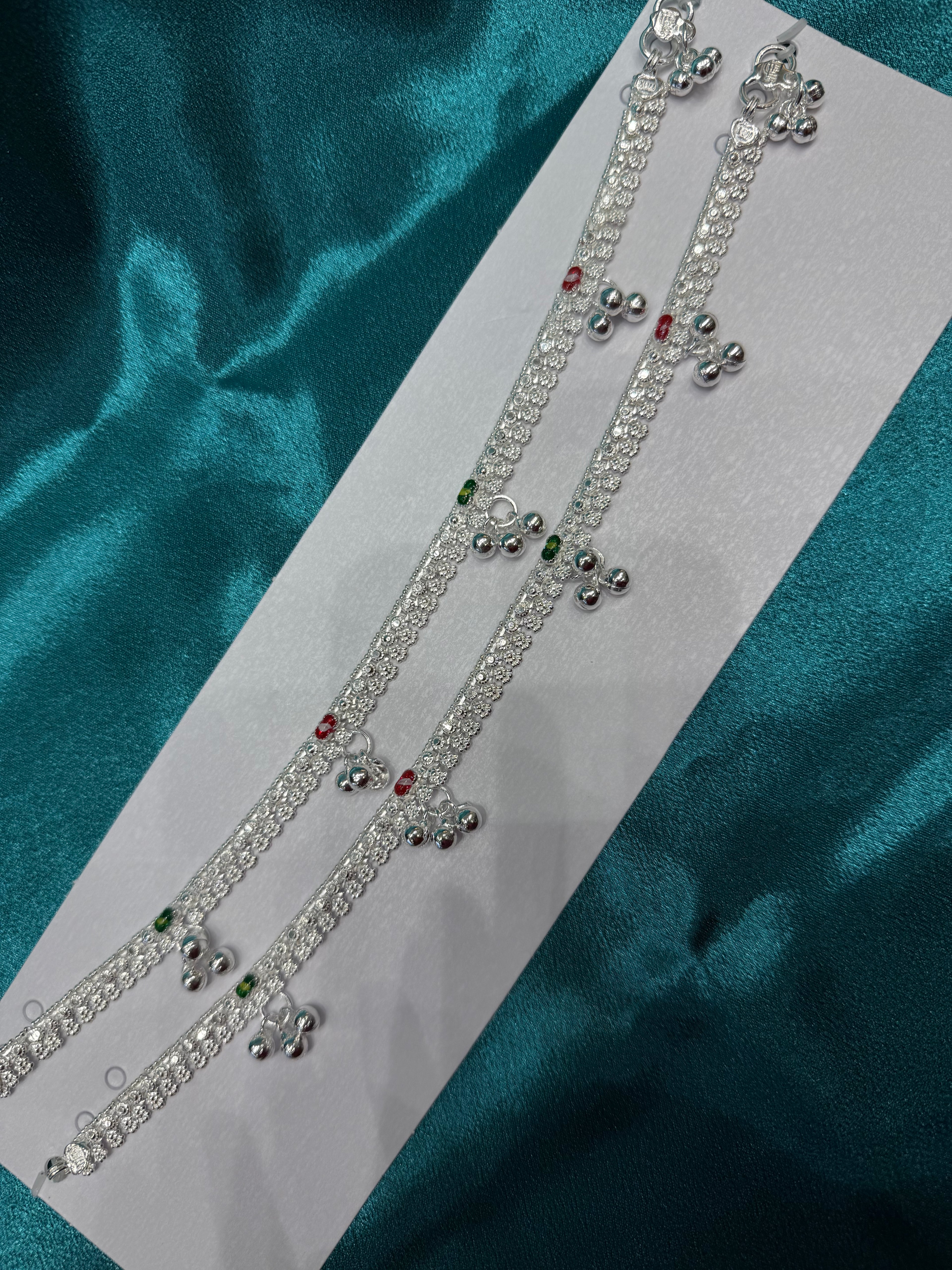Traditional silver anklet with triple bells and red green pattern