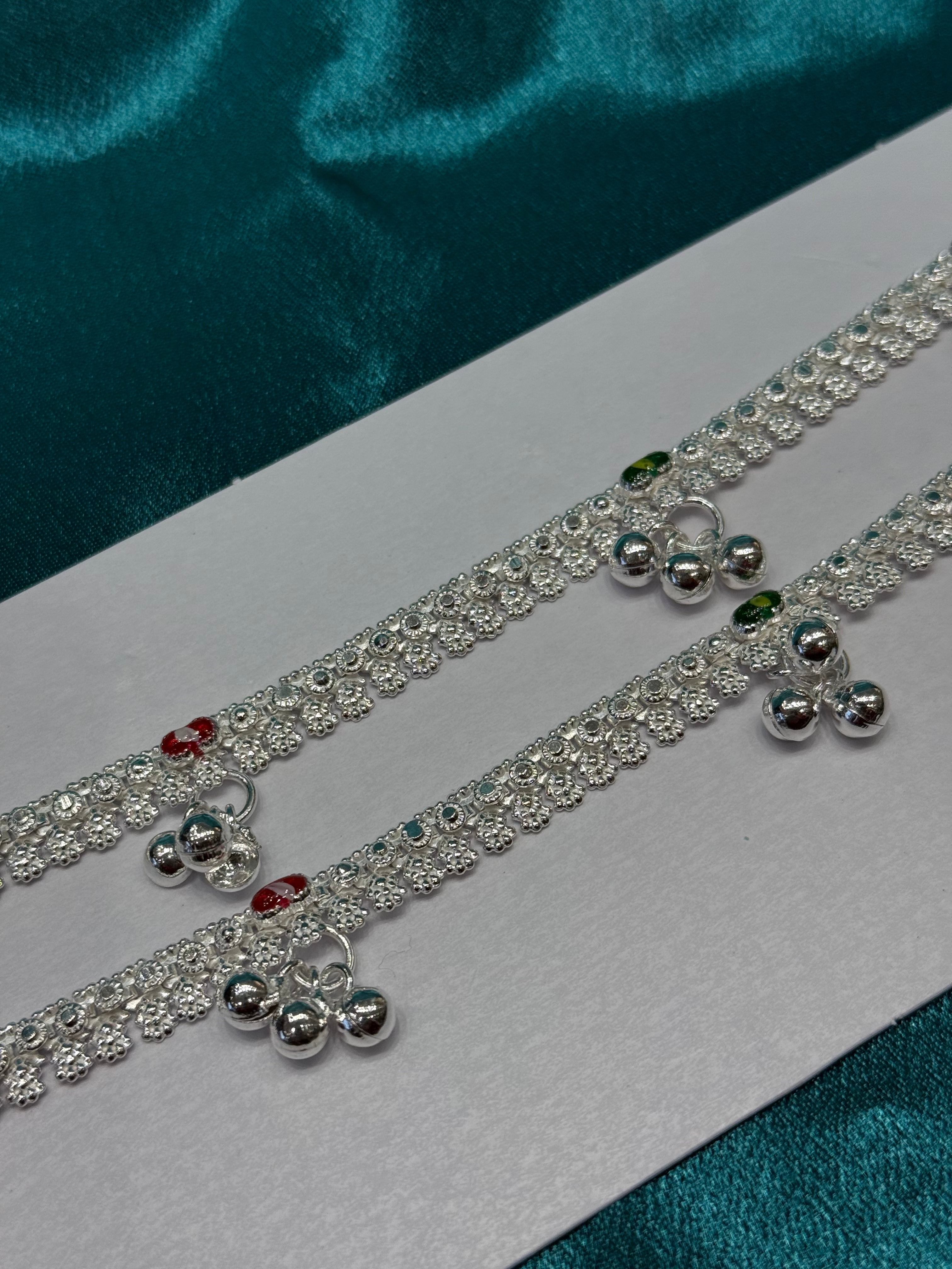 Traditional silver anklet with triple bells and red green pattern