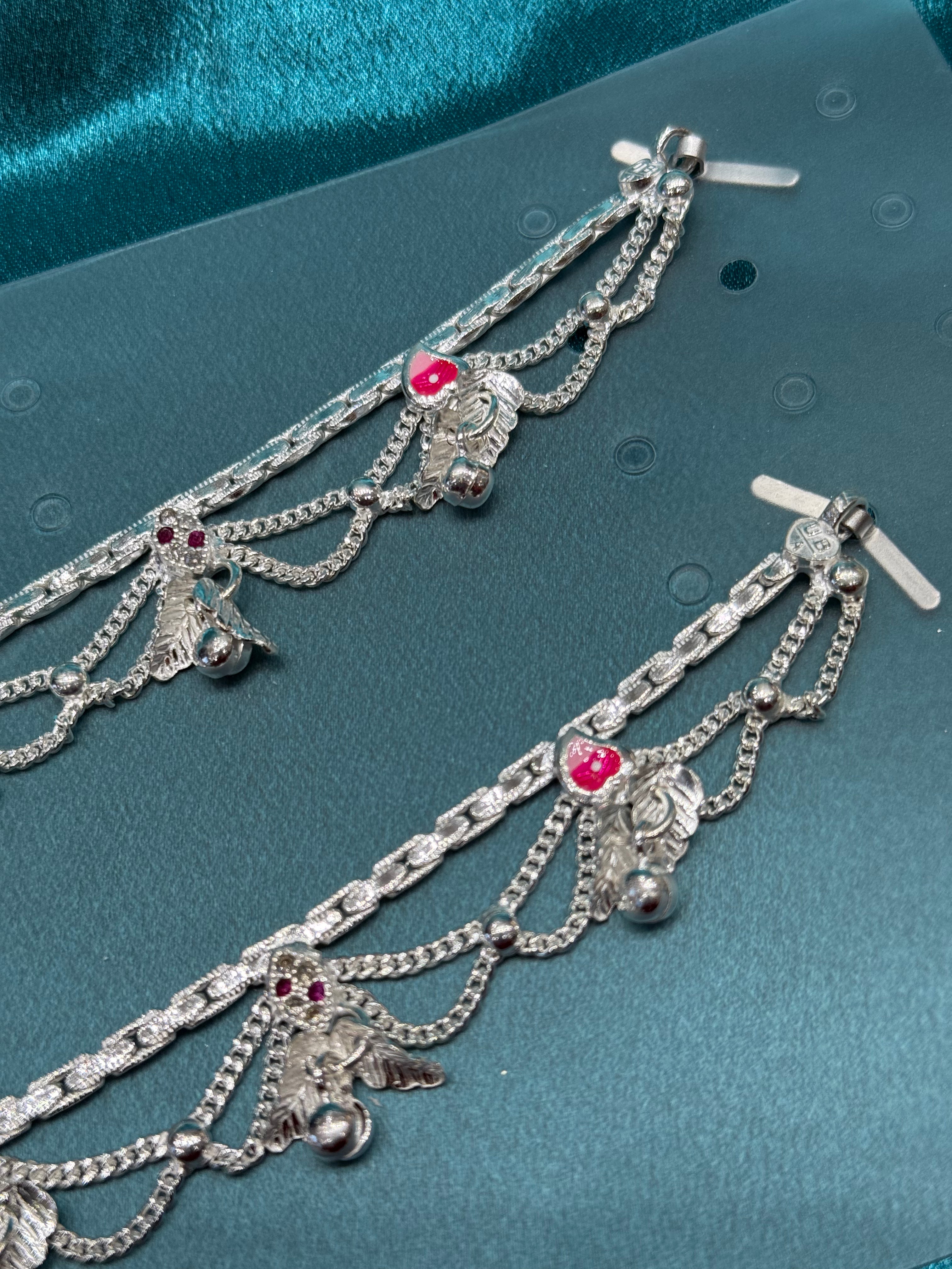 Traditional silver anklet with leaf and bell hanging