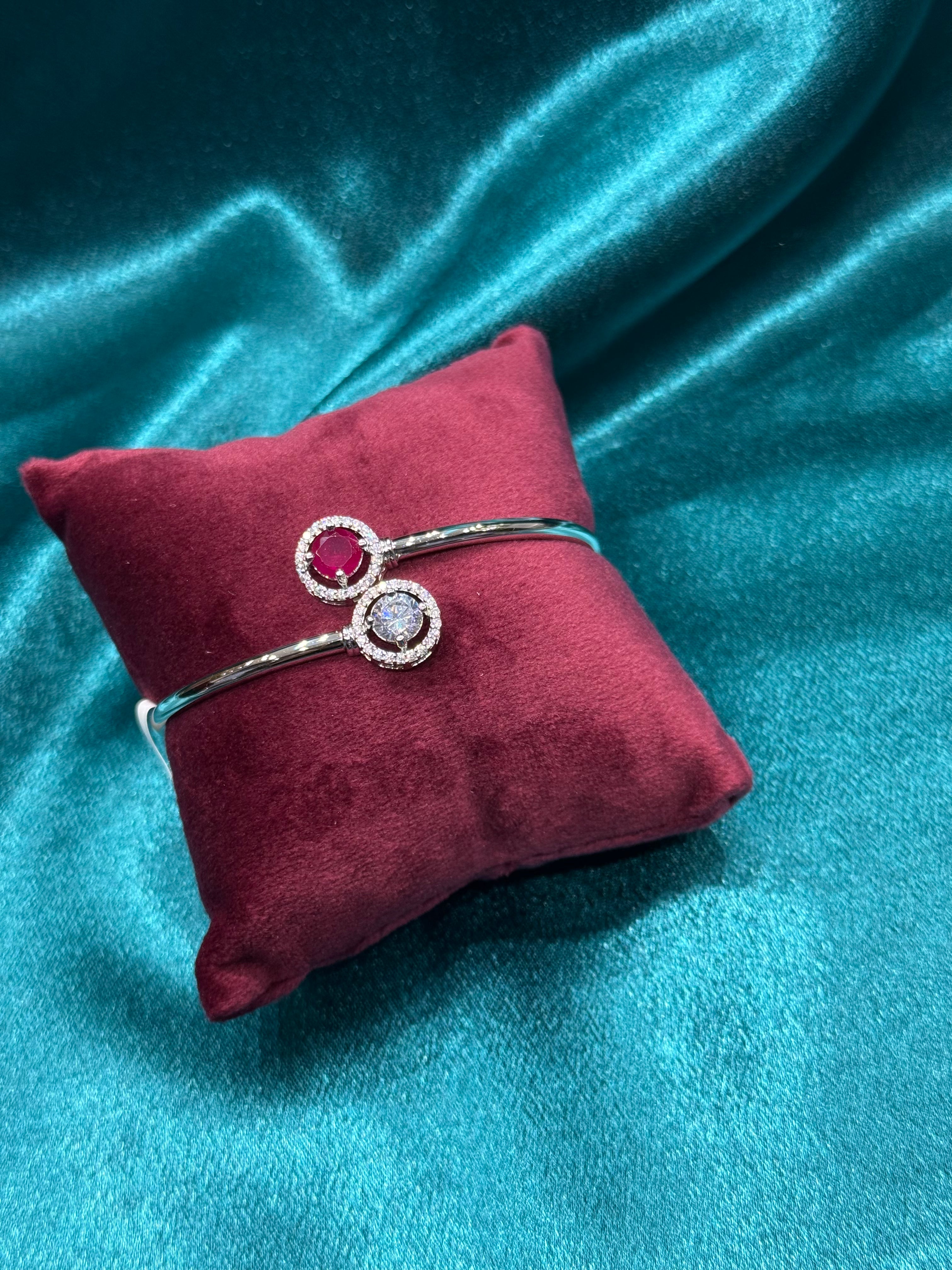 Fancy silver bracelet with cz diamond and red stone