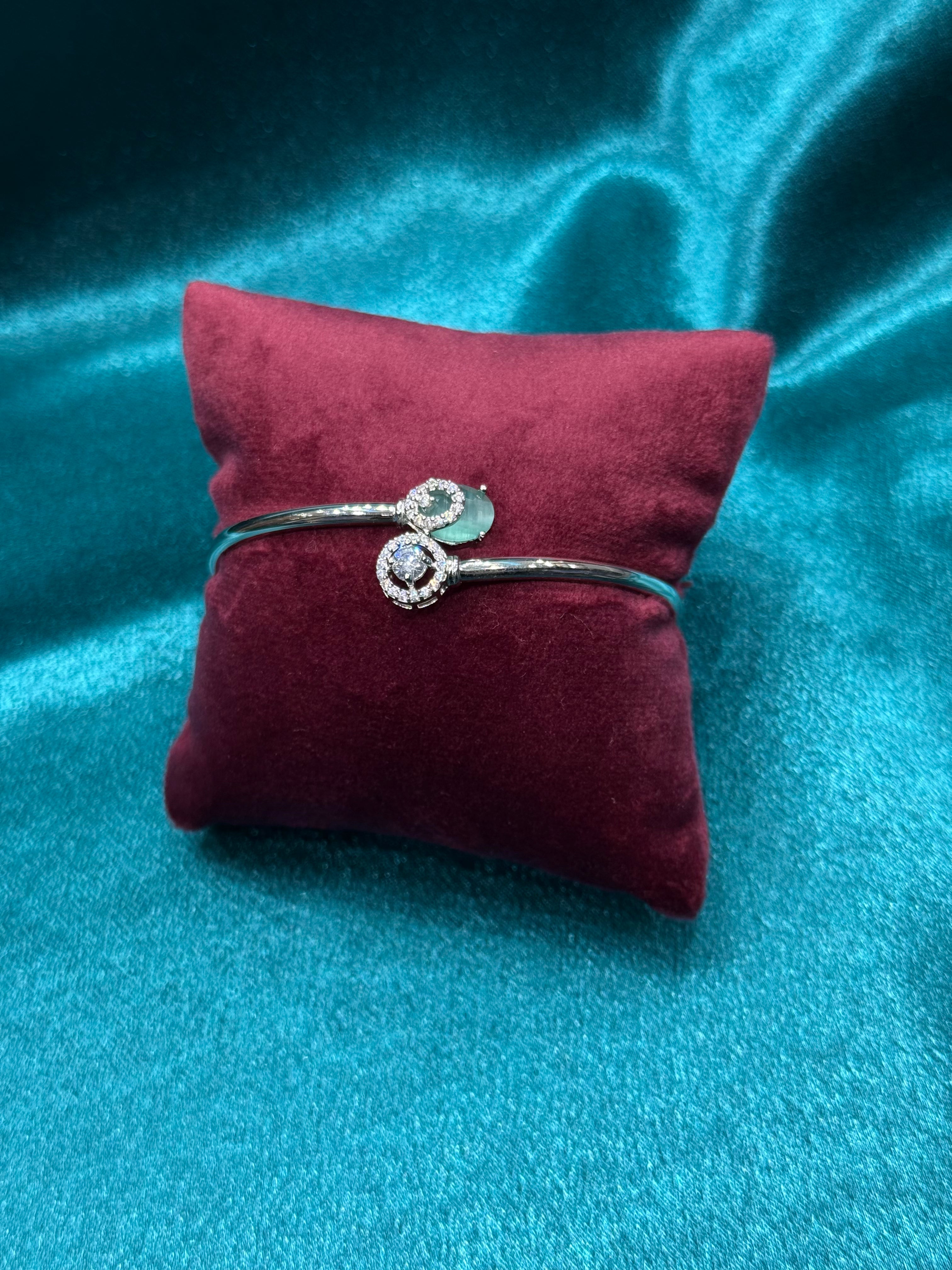 Fancy silver bracelet CZ diamond with oval shaped light green stone