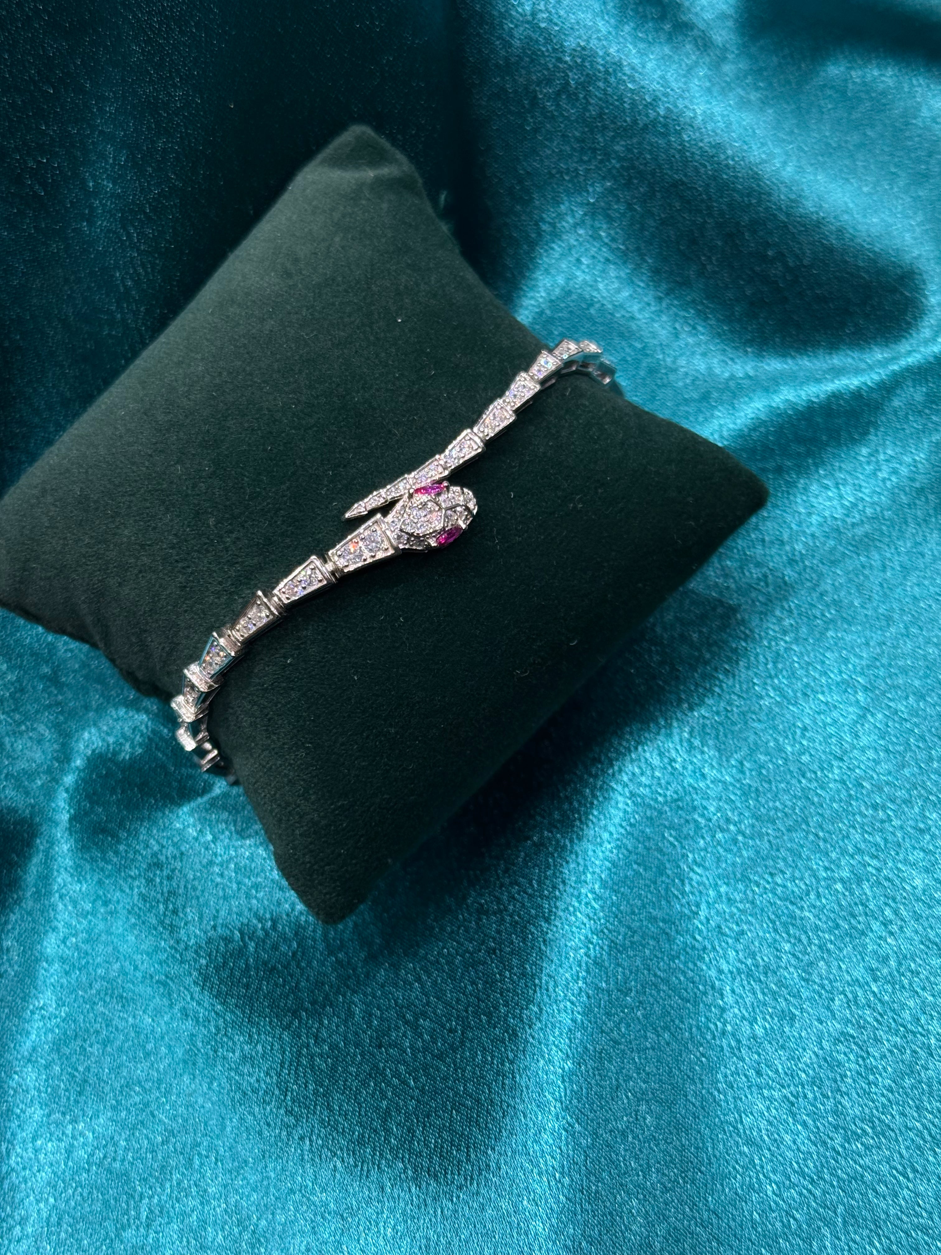 Fancy silver serpent bracelet CZ diamond with pink stone