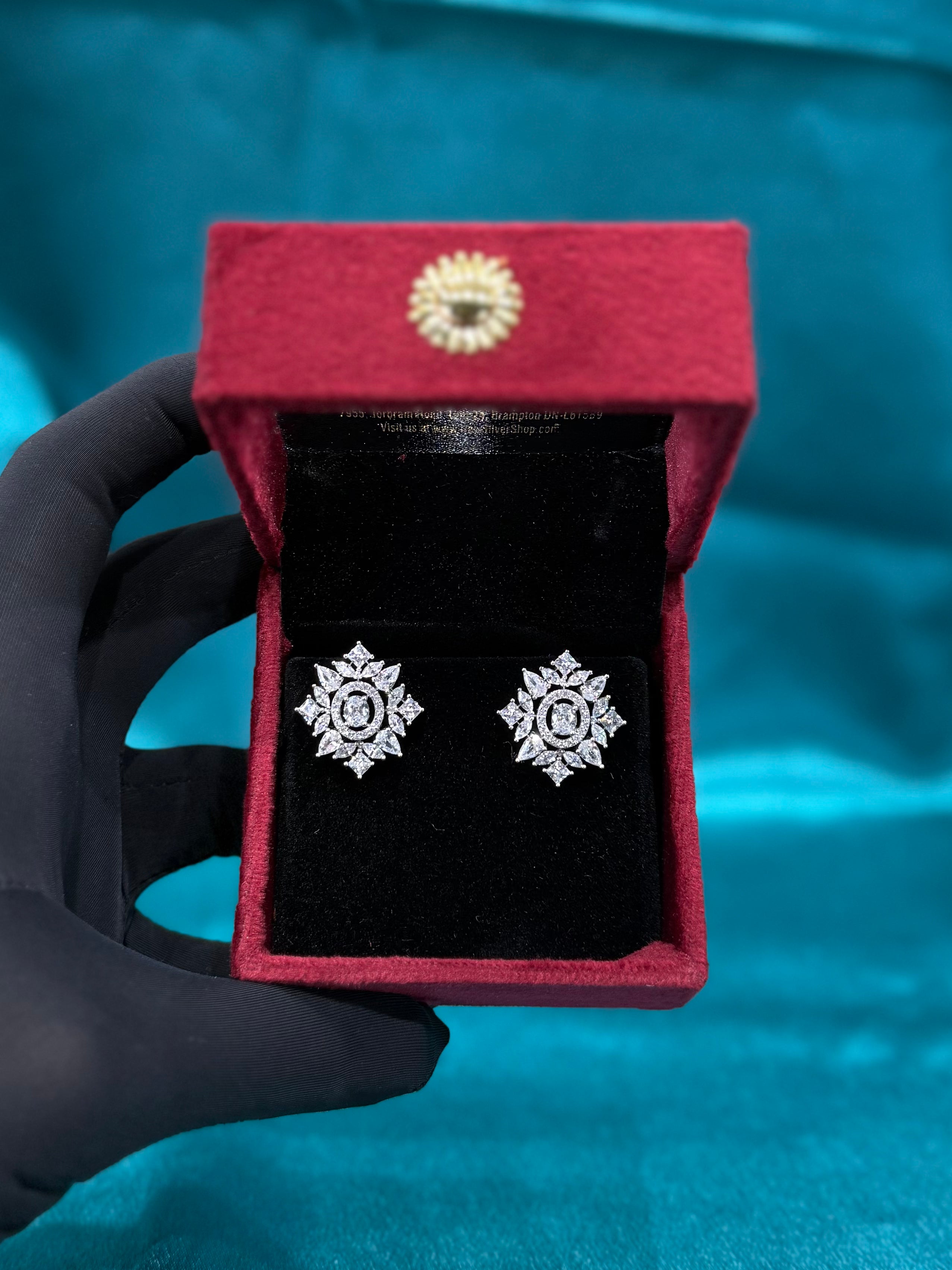 Silver earrings with white cz diamonds and centre stone