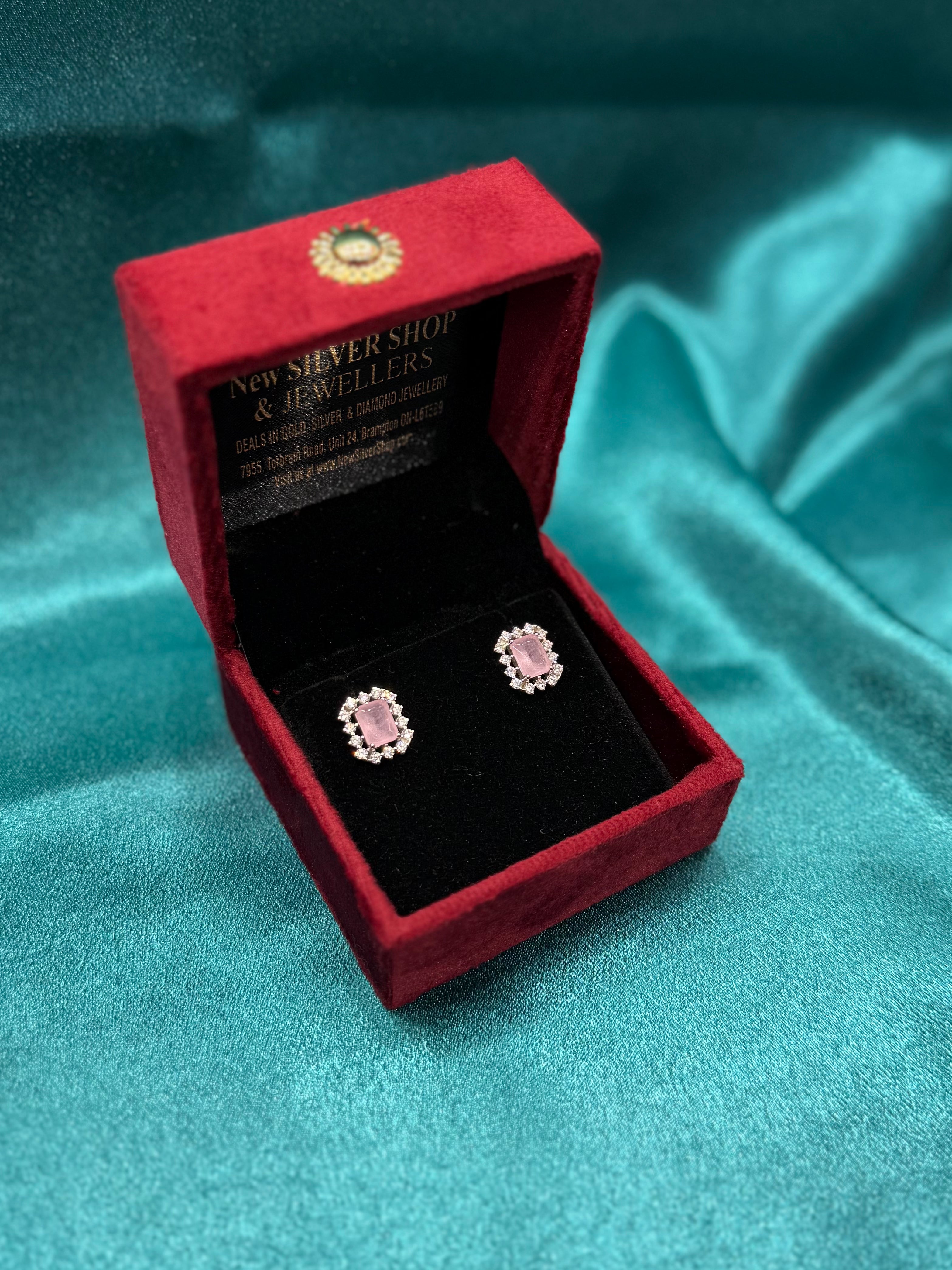 Silver earrings with pink cz diamonds and centre stone