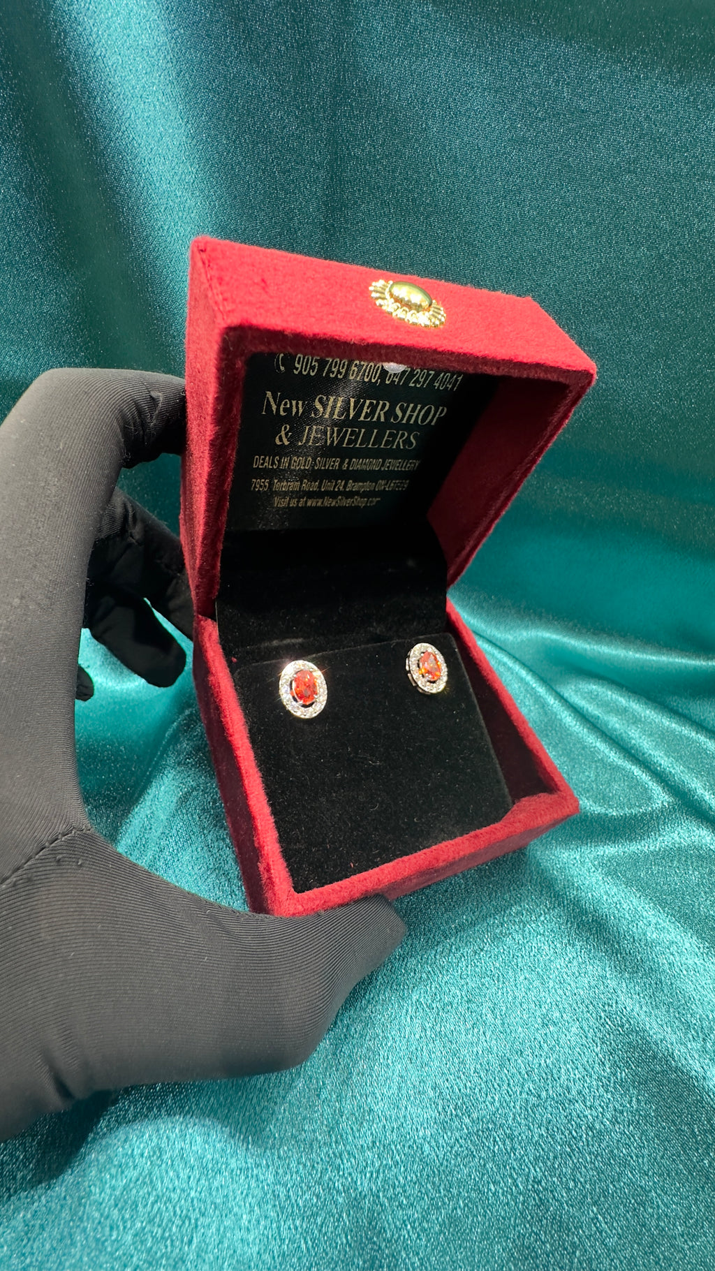 Silver earrings with orange cz diamonds and centre stone