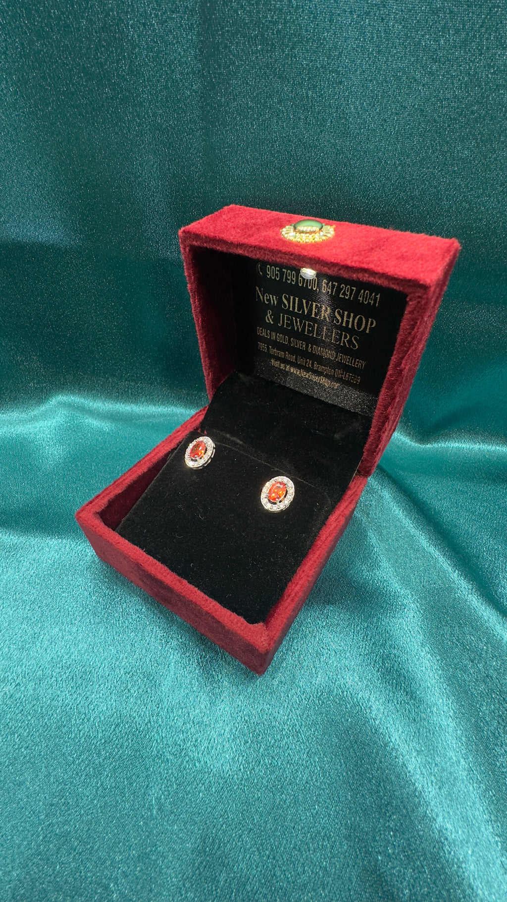 Silver earrings with orange cz diamonds and centre stone