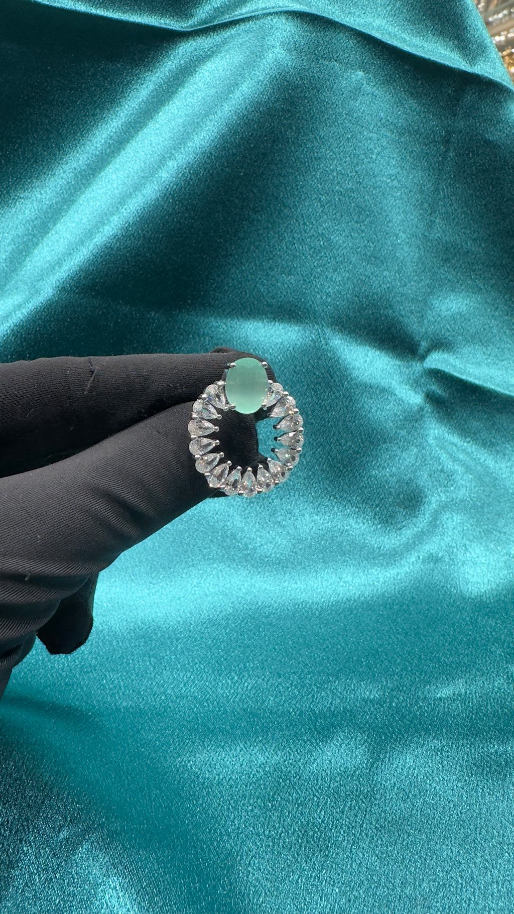 Silver earrings with pastel green cz diamond