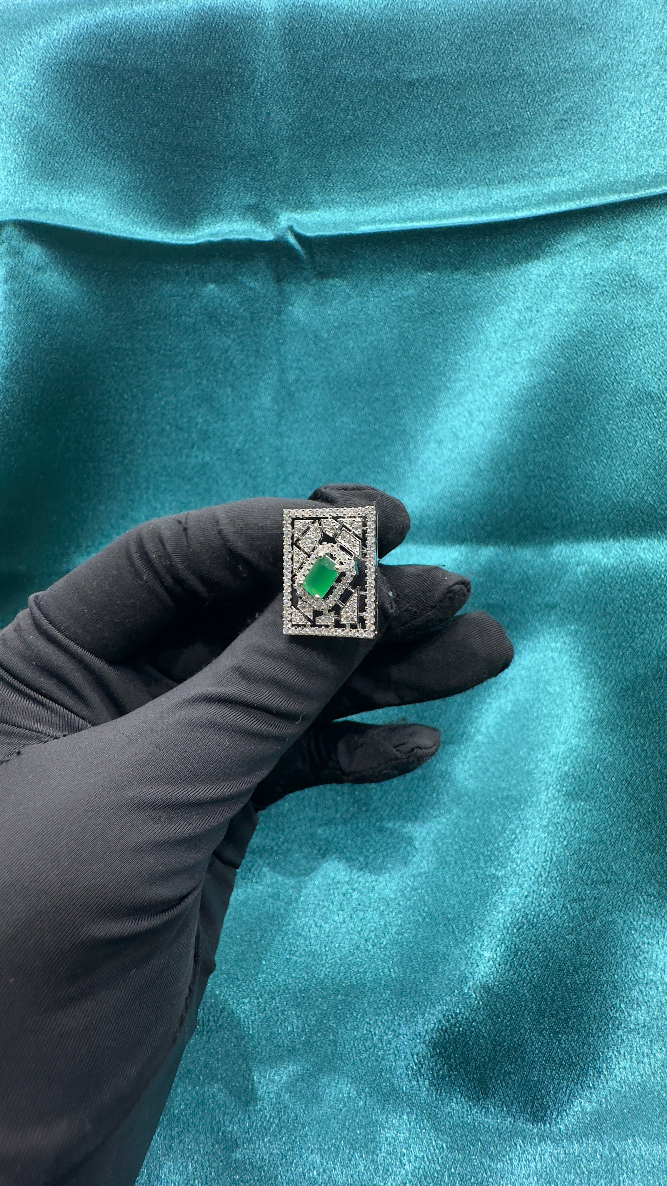 Silver earrings with green cz diamonds in rectangle shape